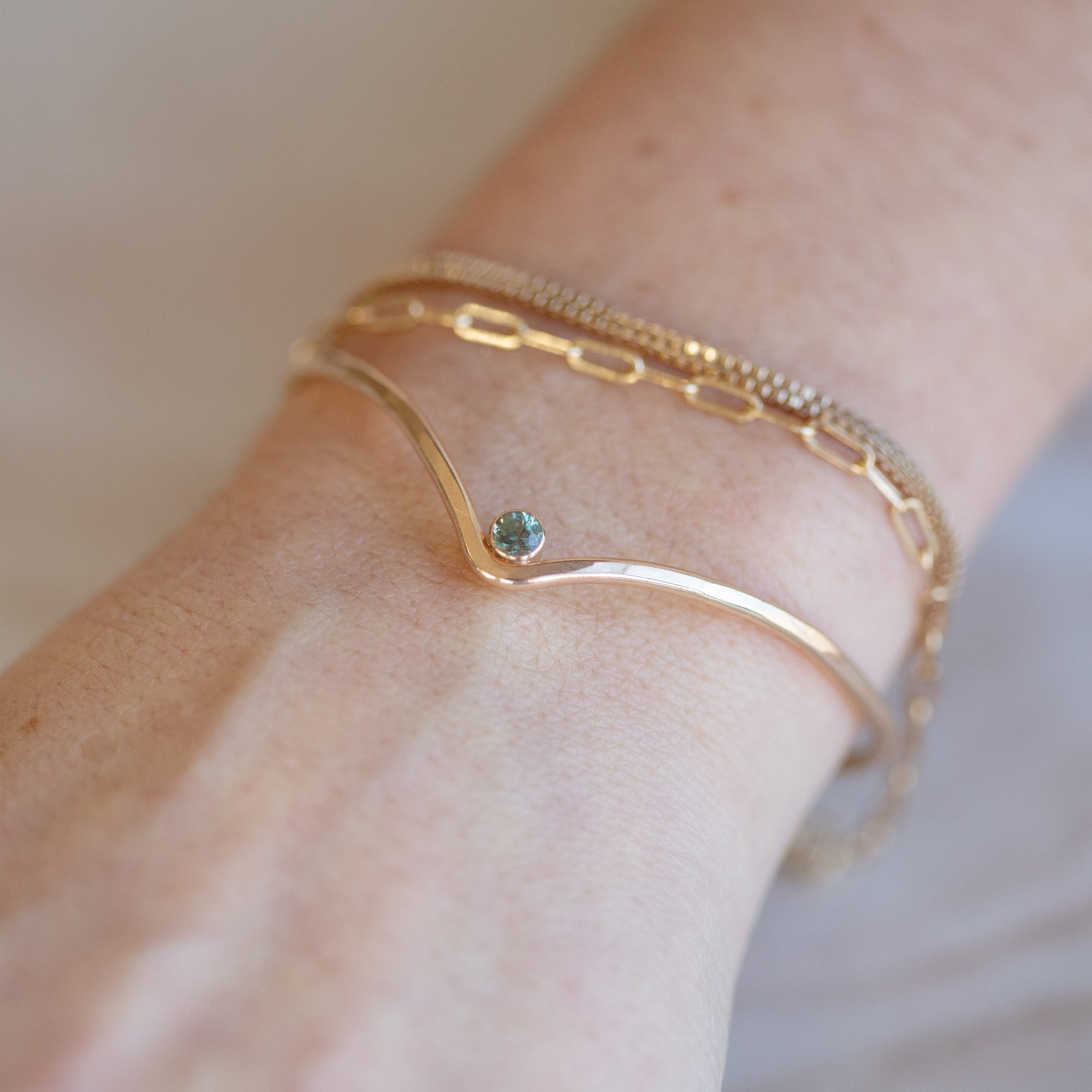 The Montana Sapphire Peak Cuff Bracelet in Yellow Gold Filled on Model