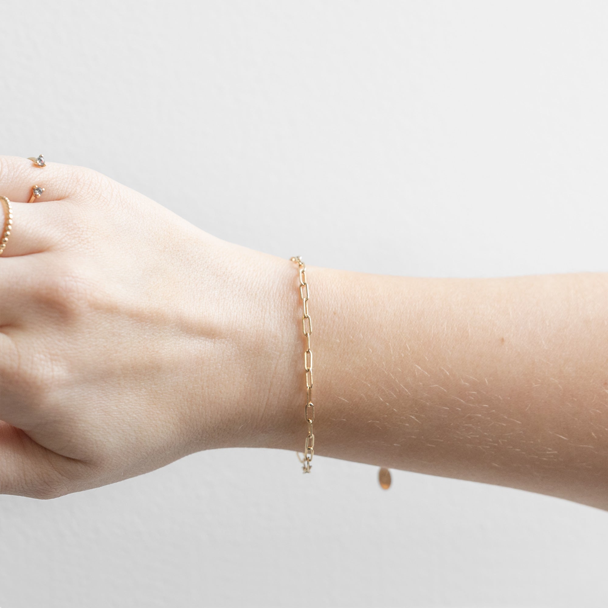 The Drawn Cable Chain Bracelet in Yellow Gold Filled on Model