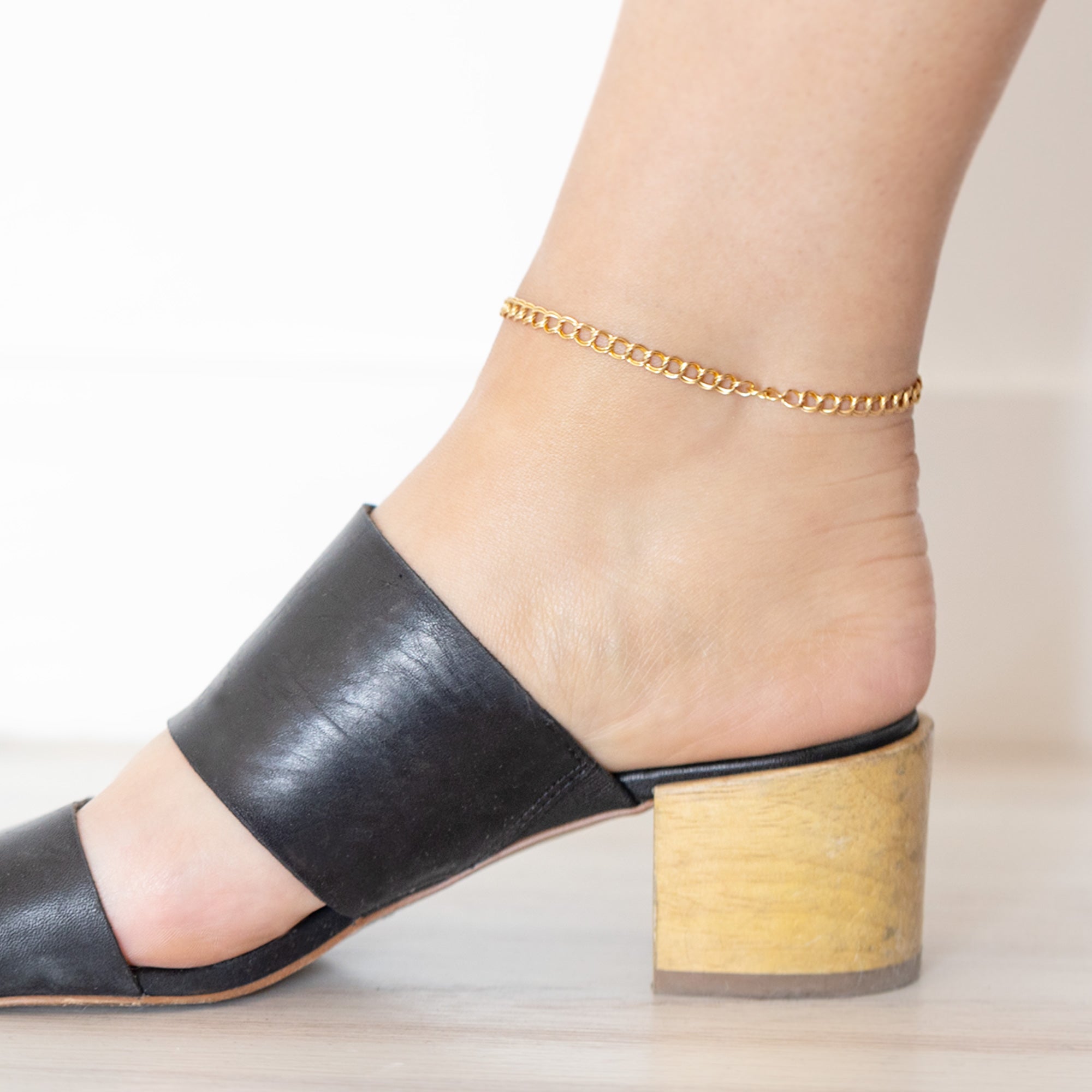 The Bold Curb Chain Anklet in Yellow Gold Filled on Model