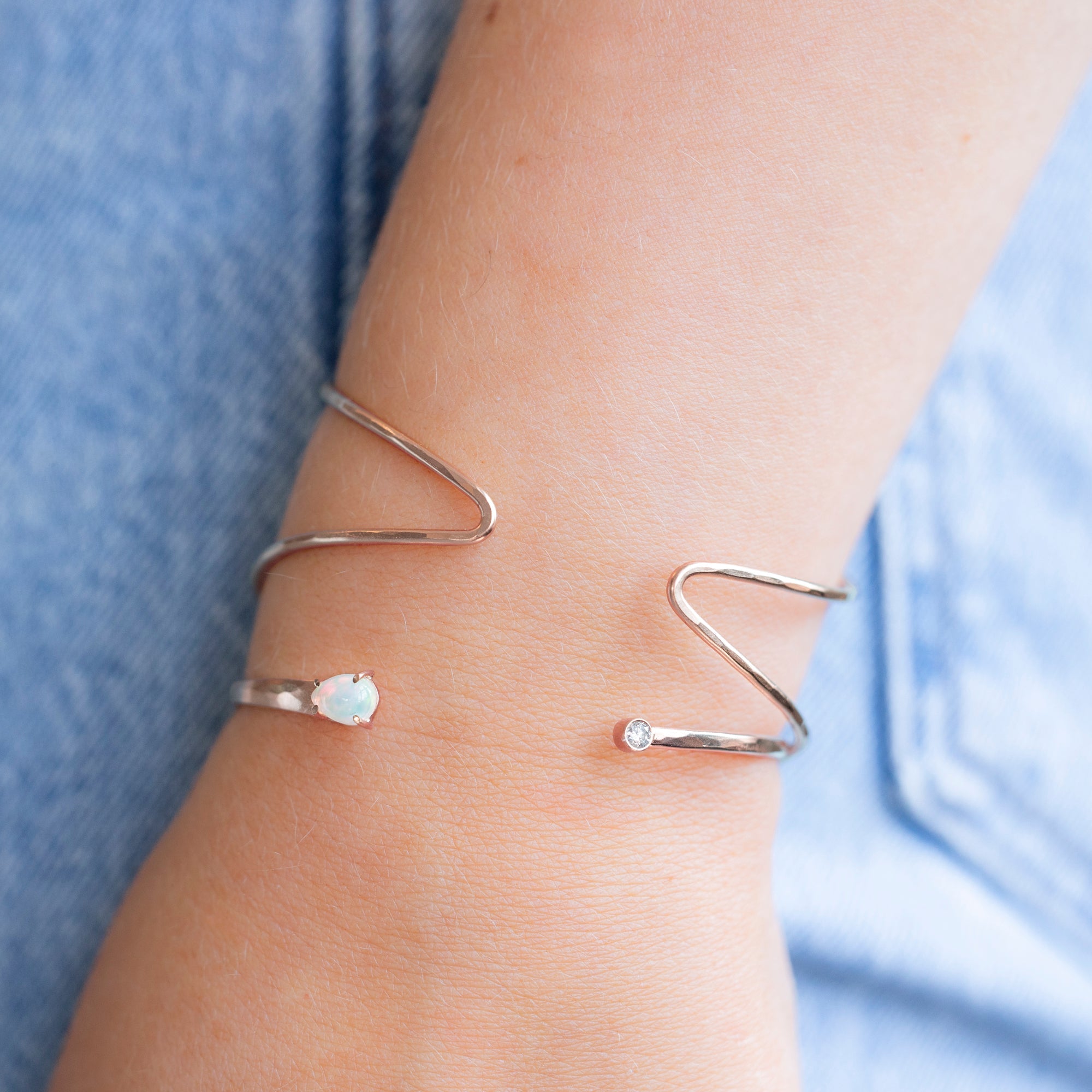 The Arrow Cuff Bracelet in Rose Gold Filled Stacked on Model