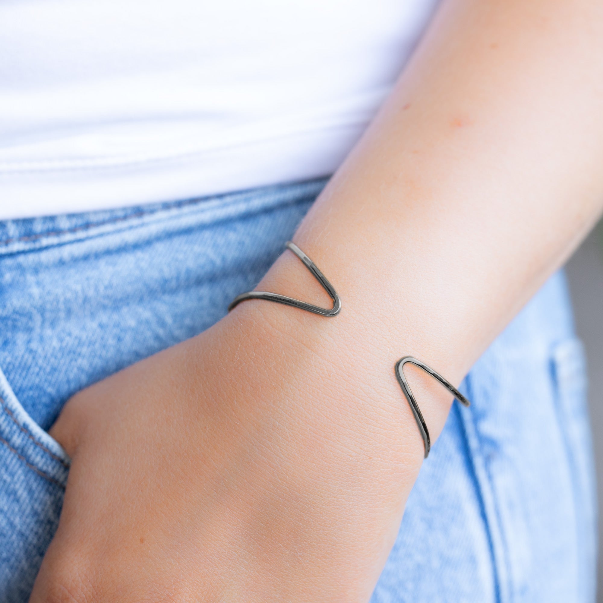 The Arrow Cuff Bracelet in Oxidized Sterling Silver on Model