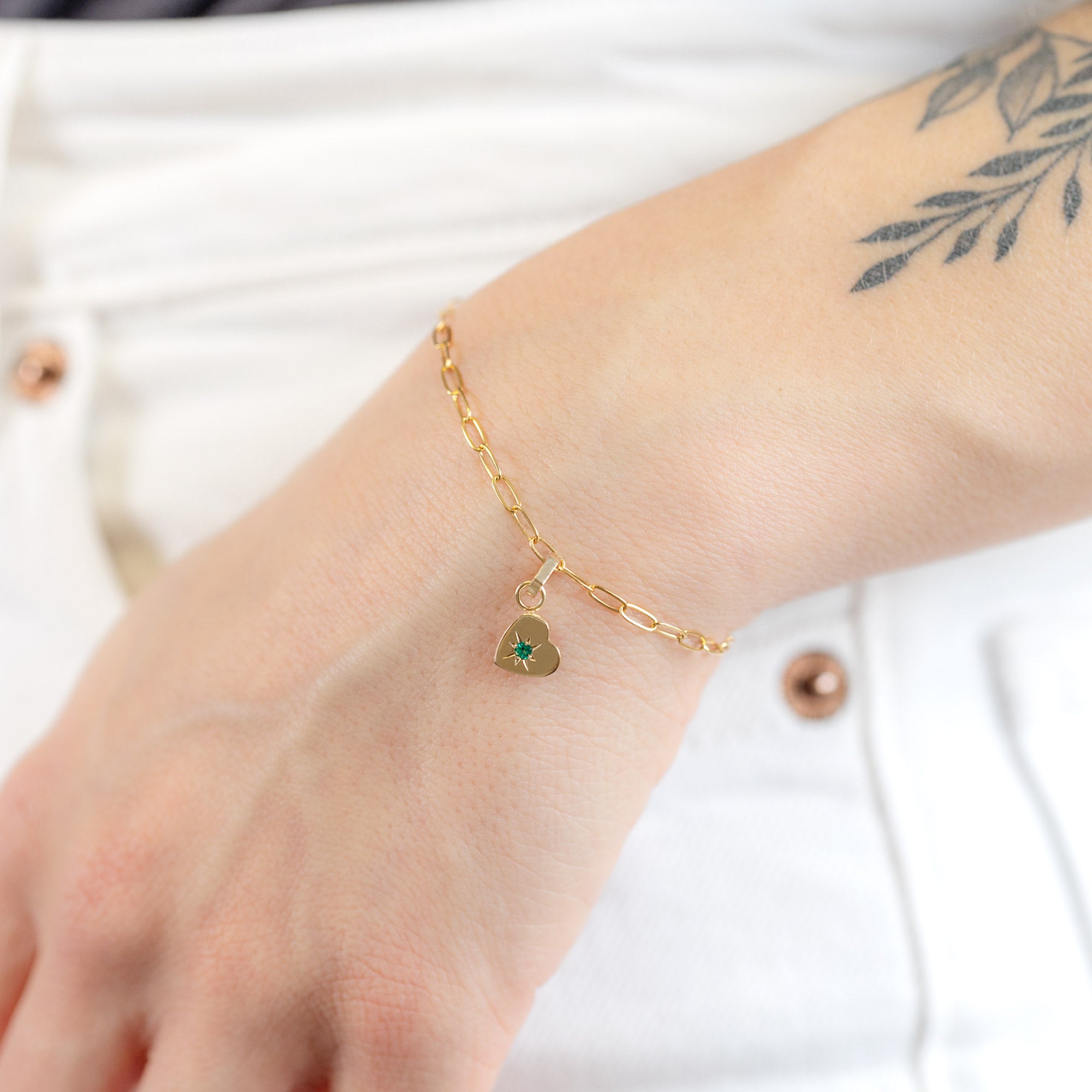 The Heart Charm in 10K Yellow Gold on Drawn Cable Chain Bracelet on Model