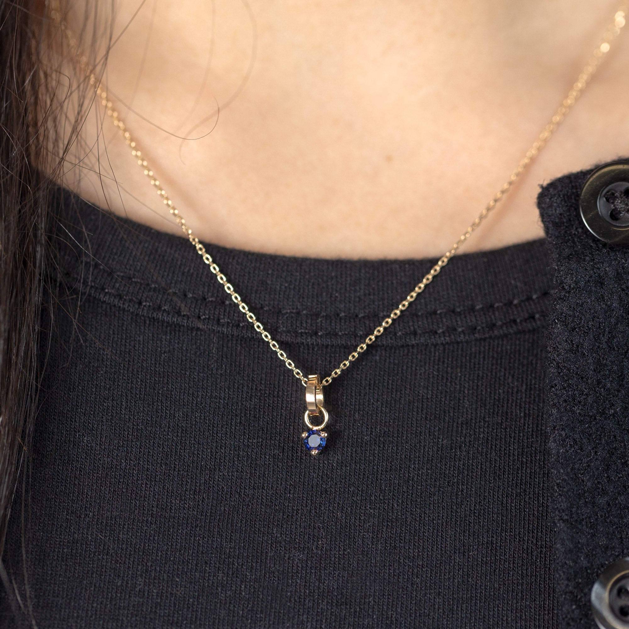 The Sapphire Birthstone Charm in 10K Yellow Gold on Diamond Cut Cable Chain Necklace on Model