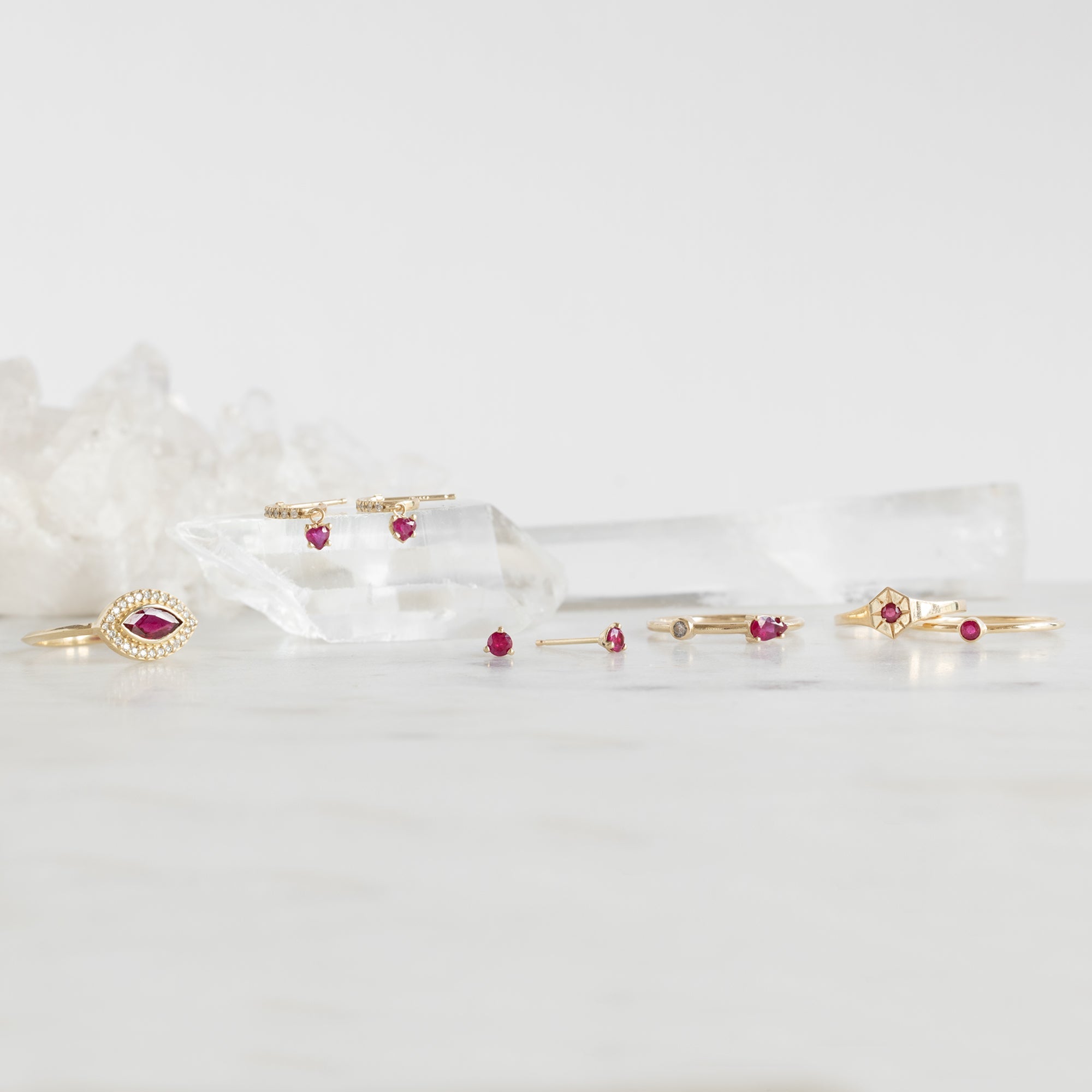 Ruby Fine Jewelry Collection on White Marble