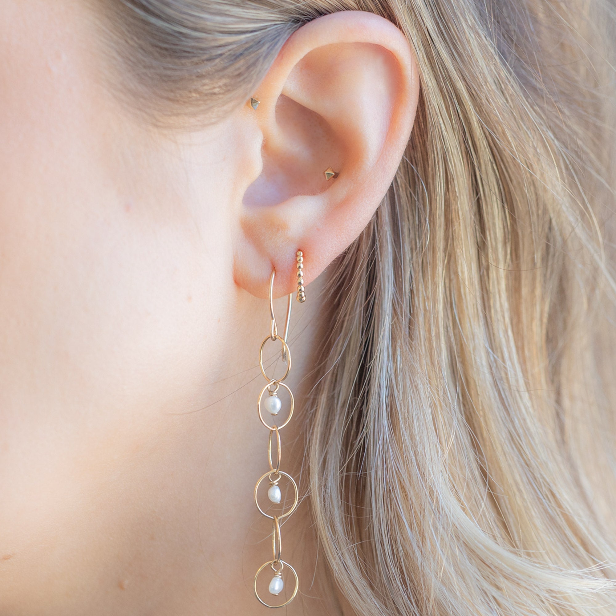 buy:the-pearl-party-drop-earrings-gold-filled,the-beaded-huggie-hoops-14k-yellow-gold