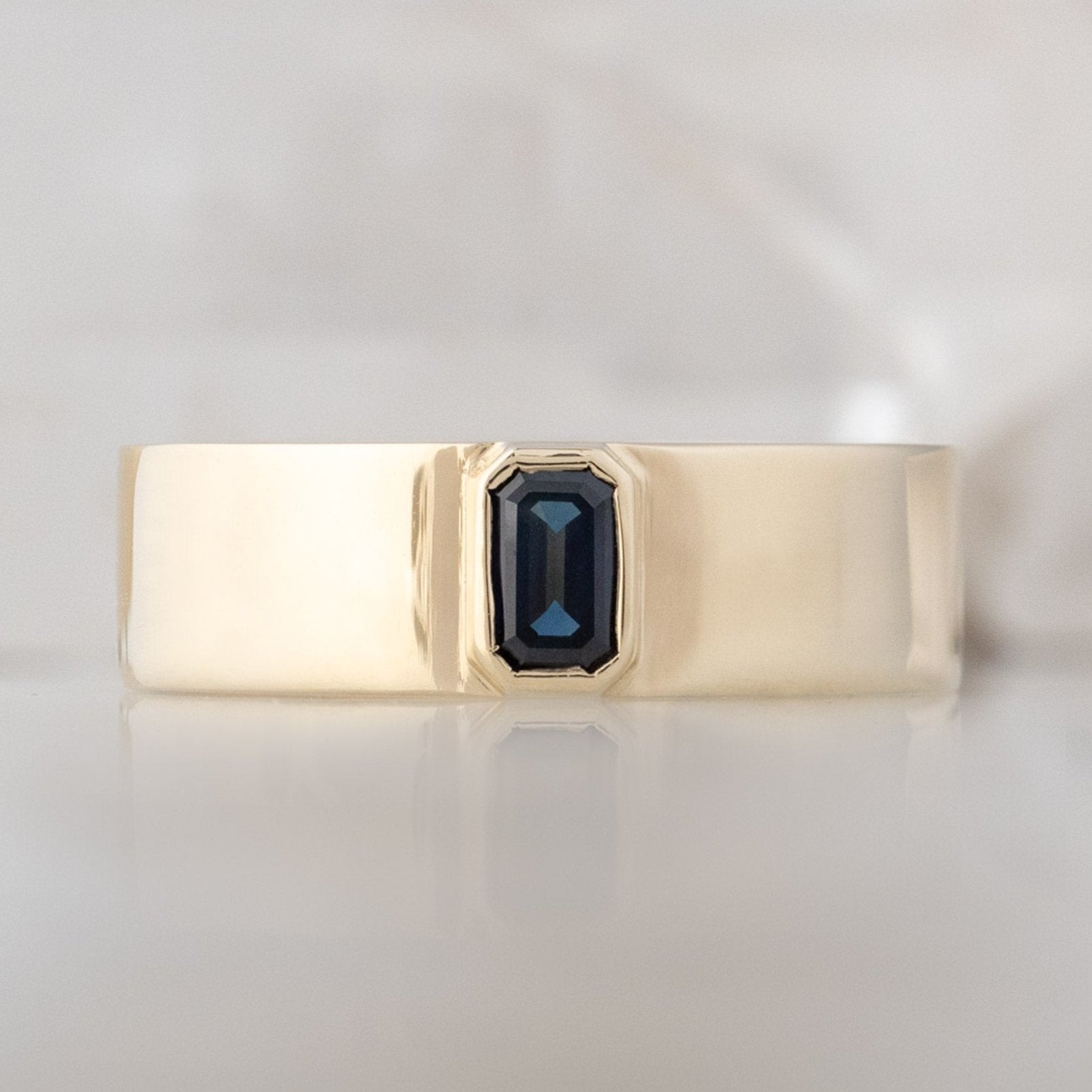 The Cigar Band with an Emerald-Cut Blue Sapphire | Yellow, Rose or White Gold