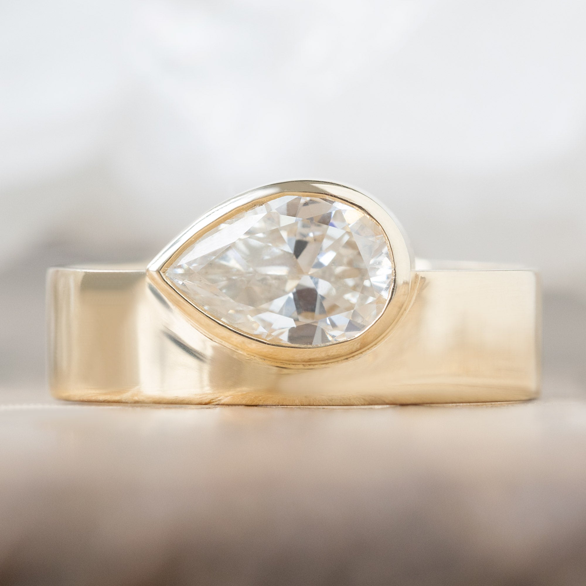 The Cigar Band | 0.91ct Pear Natural White Diamond in 14K Yellow Gold