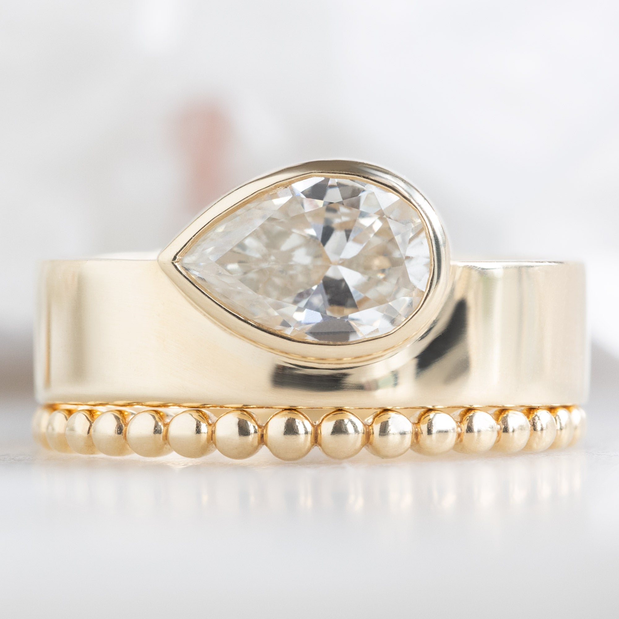The Cigar Band | 0.91ct Pear Natural White Diamond in 14K Yellow Gold