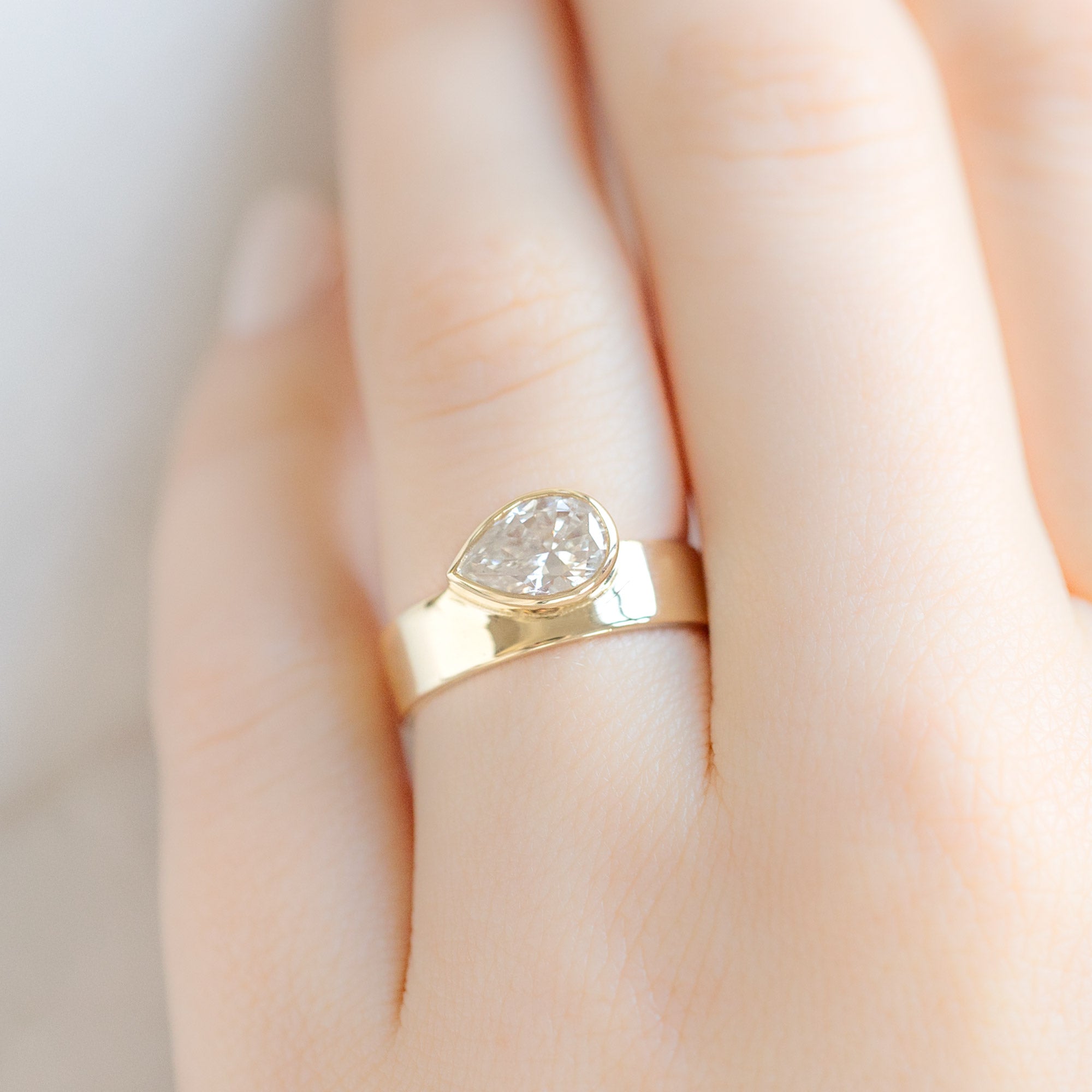 The Cigar Band | 0.91ct Pear Natural White Diamond in 14K Yellow Gold
