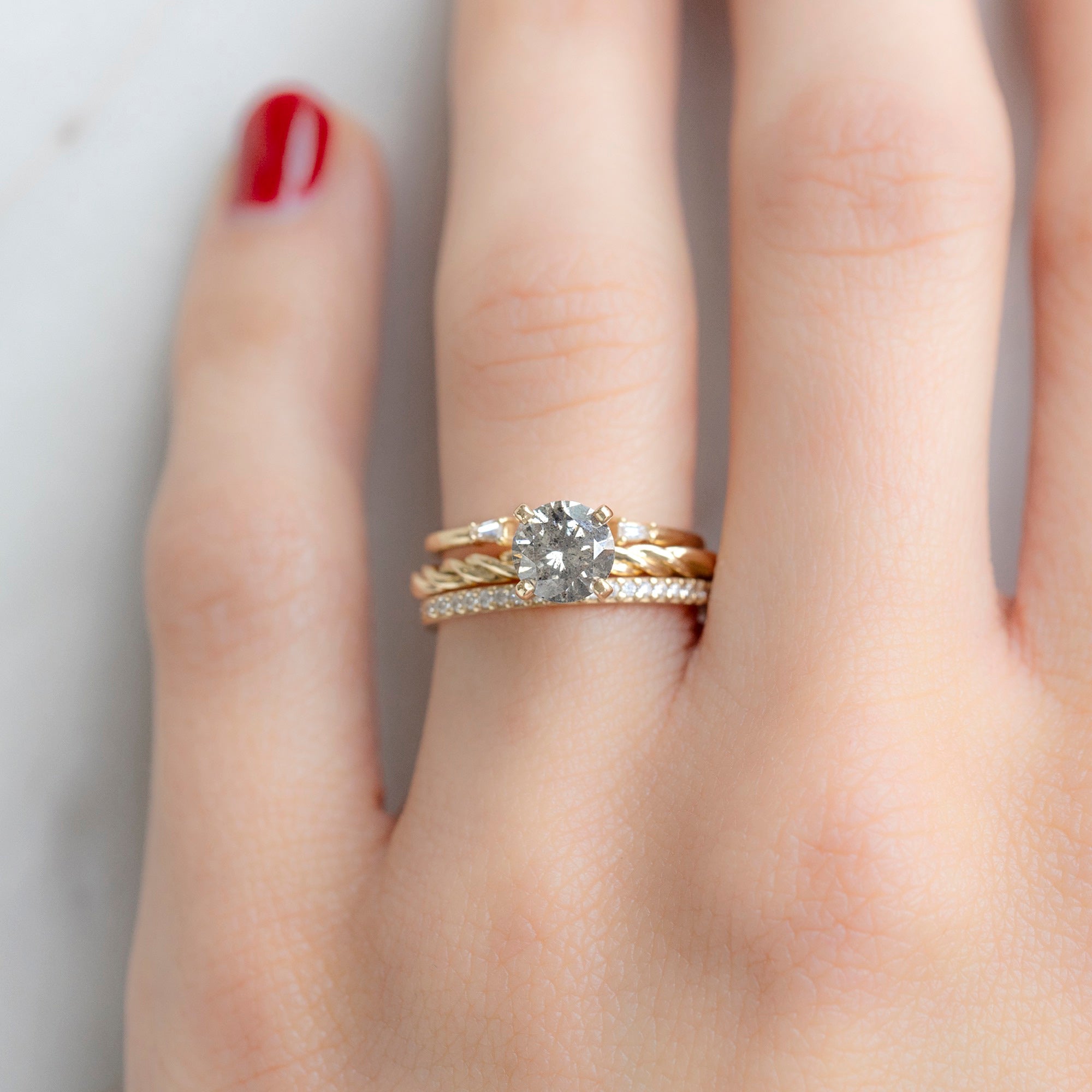 buy:the-braided-ring-1-01ct-round-salt-and-pepper-diamond-in-14k-yellow-gold,open-cuff-baguette-white-diamond-stacking-band-14k-or-18k-yellow-gold,the-white-diamond-pave-wedding-band-14k-or-18k-yellow-gold
