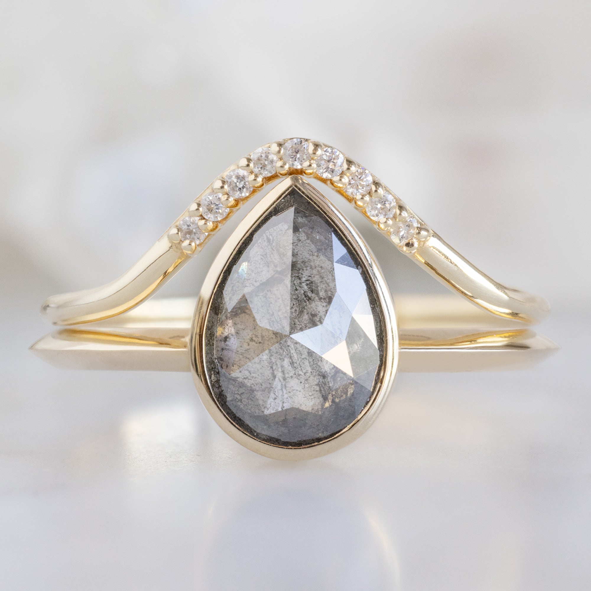 The Hazel Ring with a 1.28ct Rose Cut Salt and Pepper Diamond in 14K Yellow Gold Stacked with the Pavé Arc Stacking Band