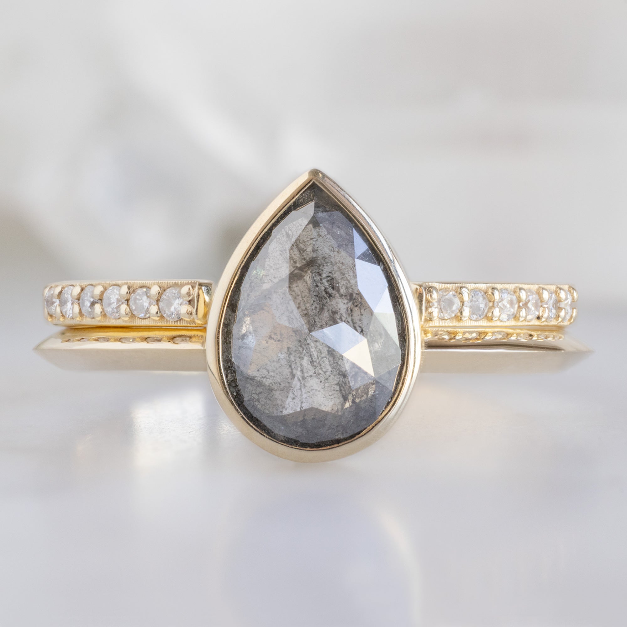 The Hazel Ring with a 1.28ct Rose Cut Salt and Pepper Diamond in 14K Yellow Gold Stacked with the Open Cuff Pavé Diamond Stacking Band