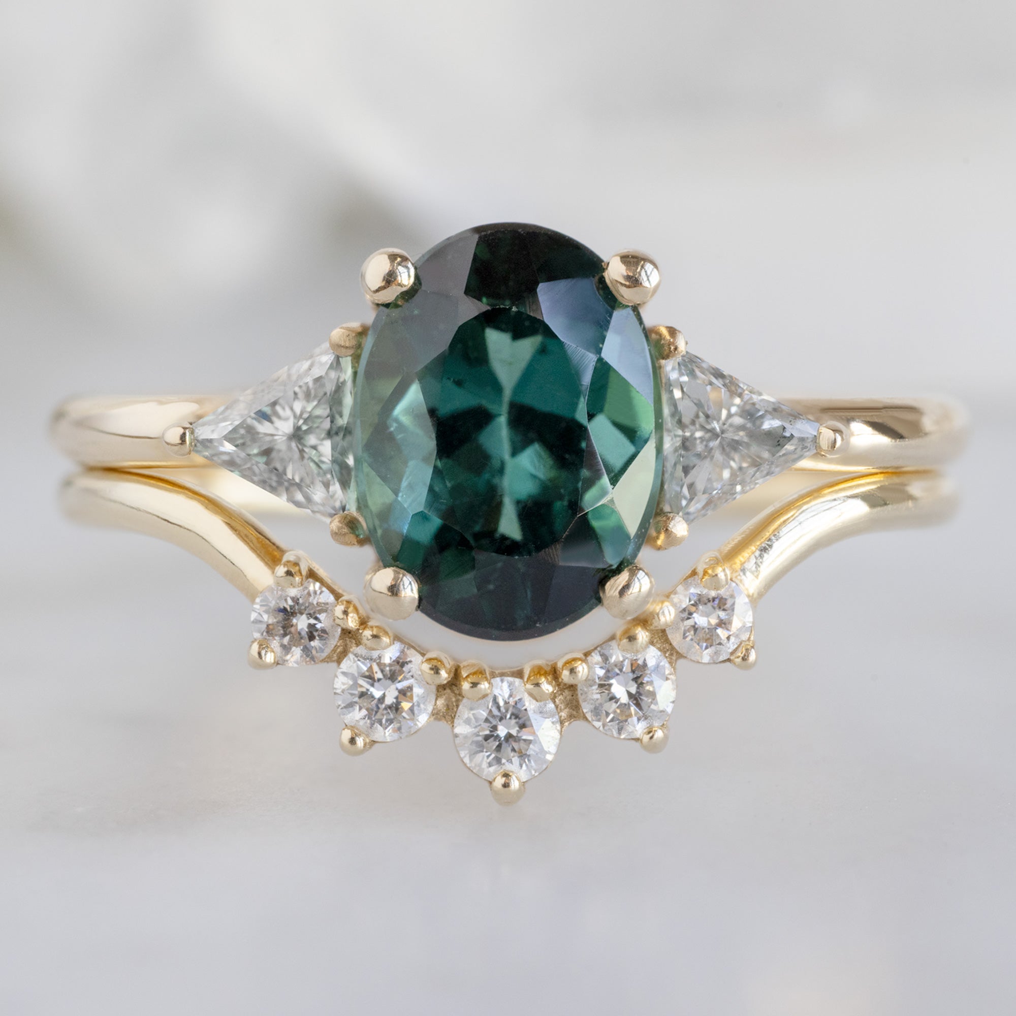 The Jade Ring with a 1.49ct Oval Cut Tourmaline in 14K Yellow Gold Stacked with the Round White Diamond Sunburst Stacking Band
