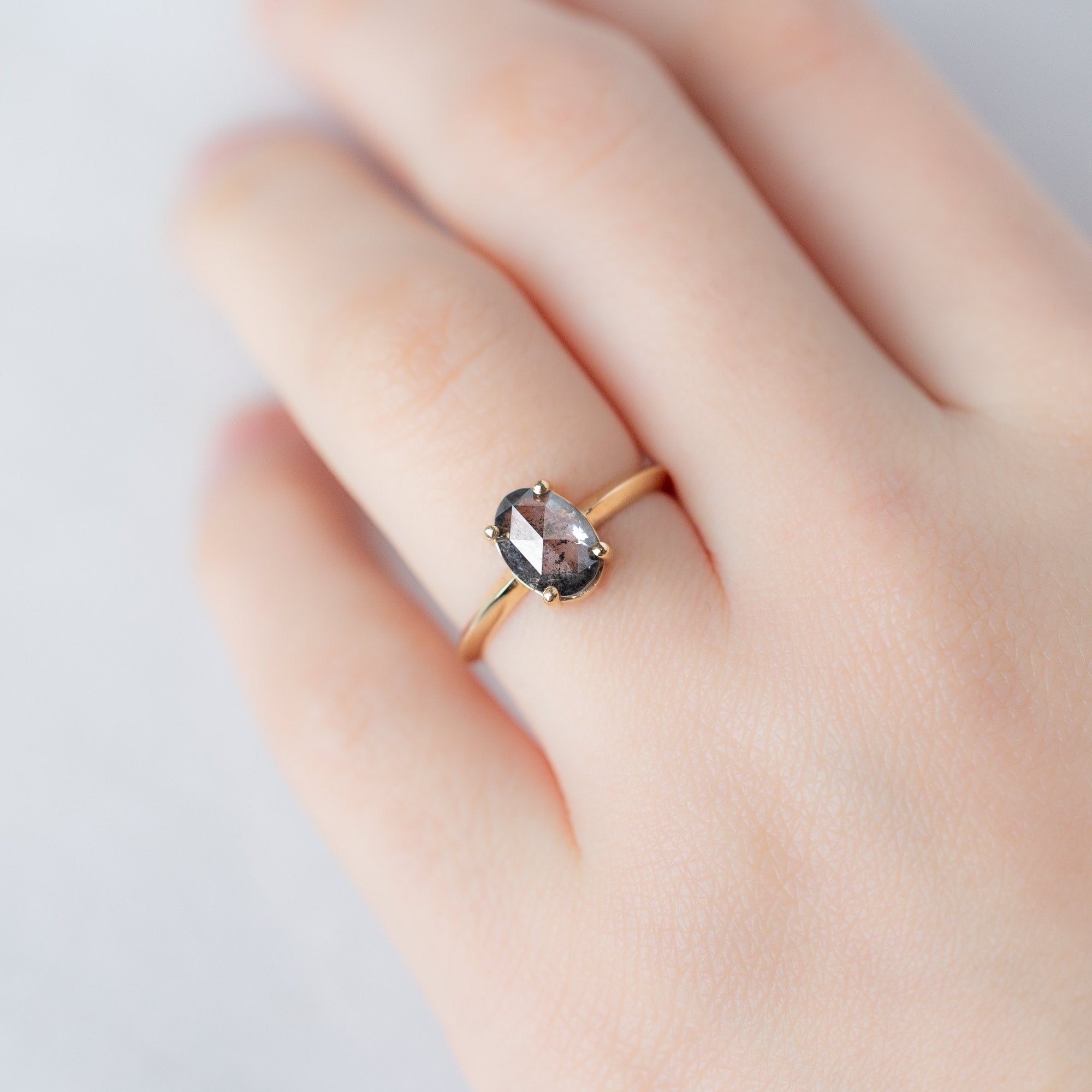 The Bryn Ring with a 1.41ct Oval Salt and Pepper Diamond in 14K Yellow Gold  on Model