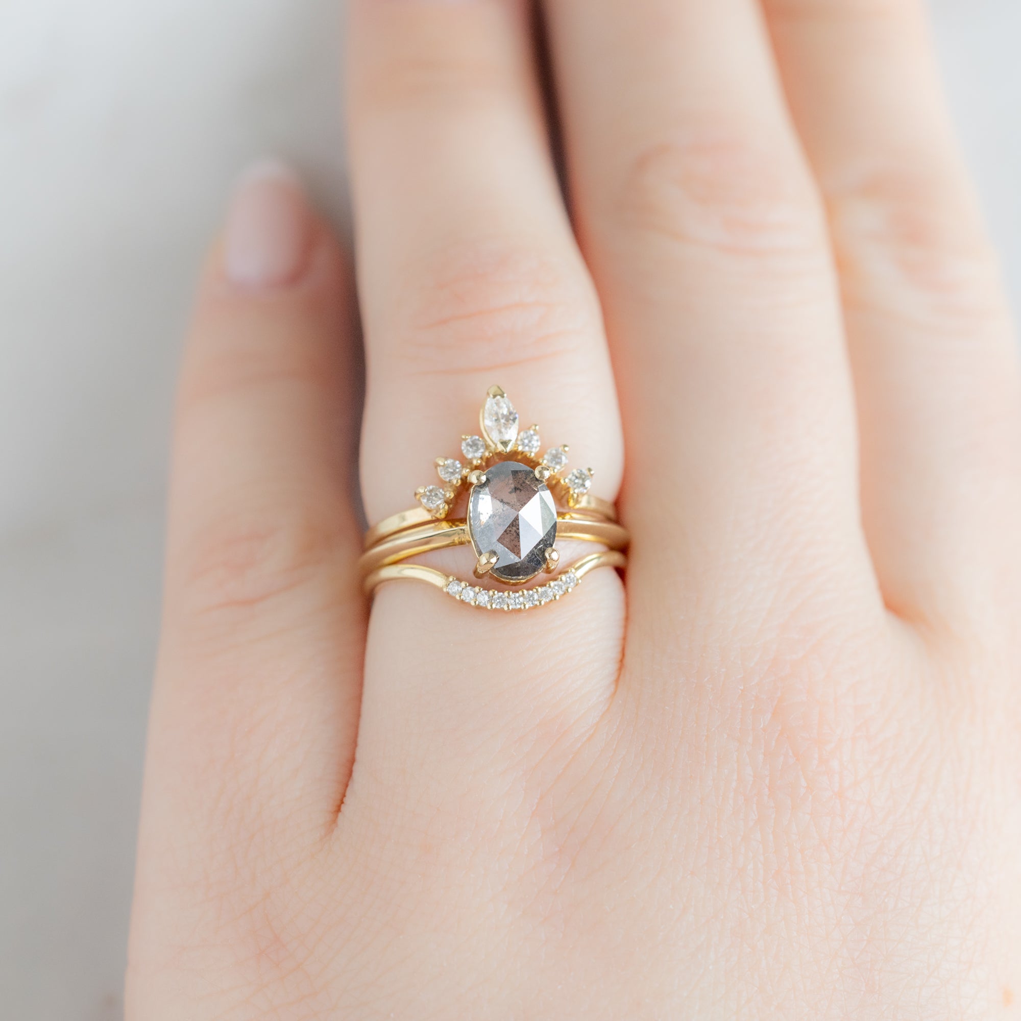 buy:marquise-white-diamond-sunburst-stacking-band-14k-gold,the-bryn-ring-1-41ct-oval-salt-and-pepper-diamond-in-14k-yellow-gold,white-diamond-pave-arc-stacking-band-14k-or-18k-yellow-gold