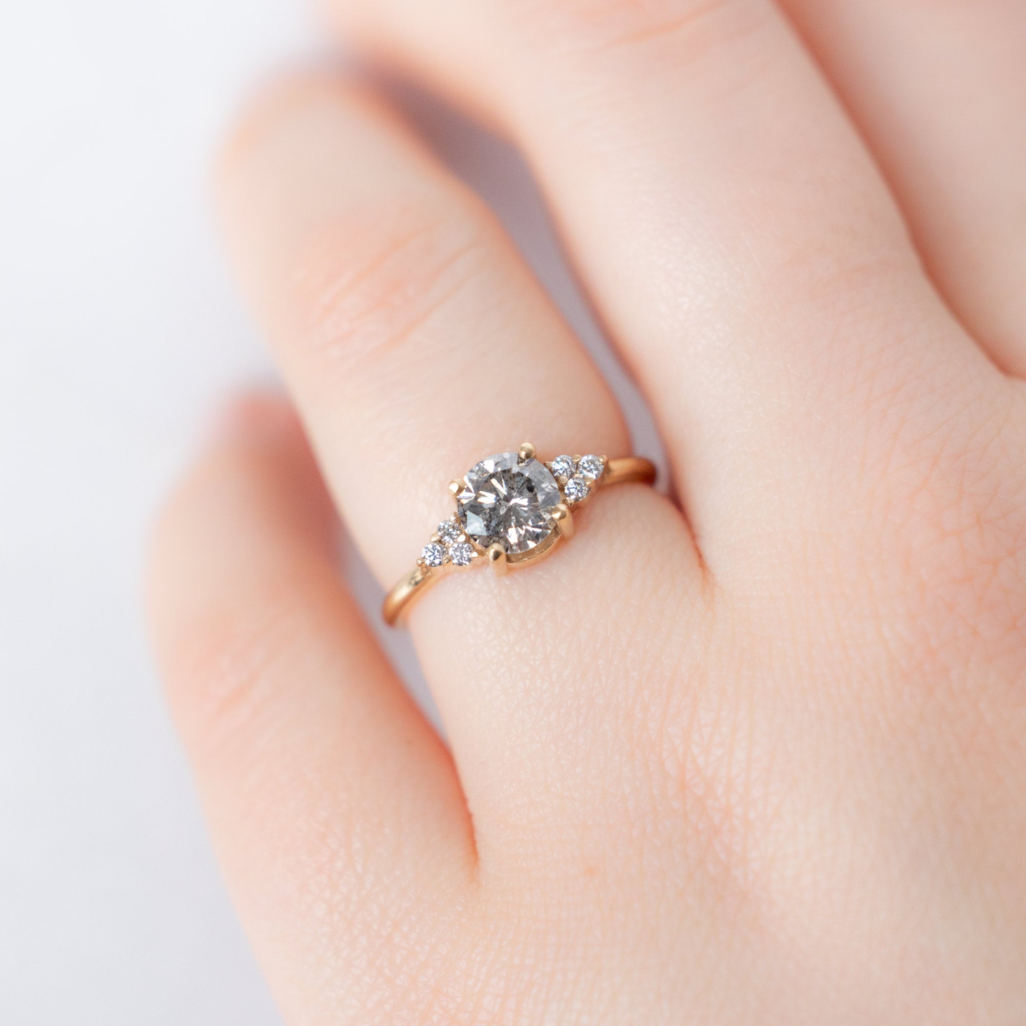 The Ivy Ring with a 1.01ct Round Salt and Pepper Diamond in 14K Yellow Gold on Model