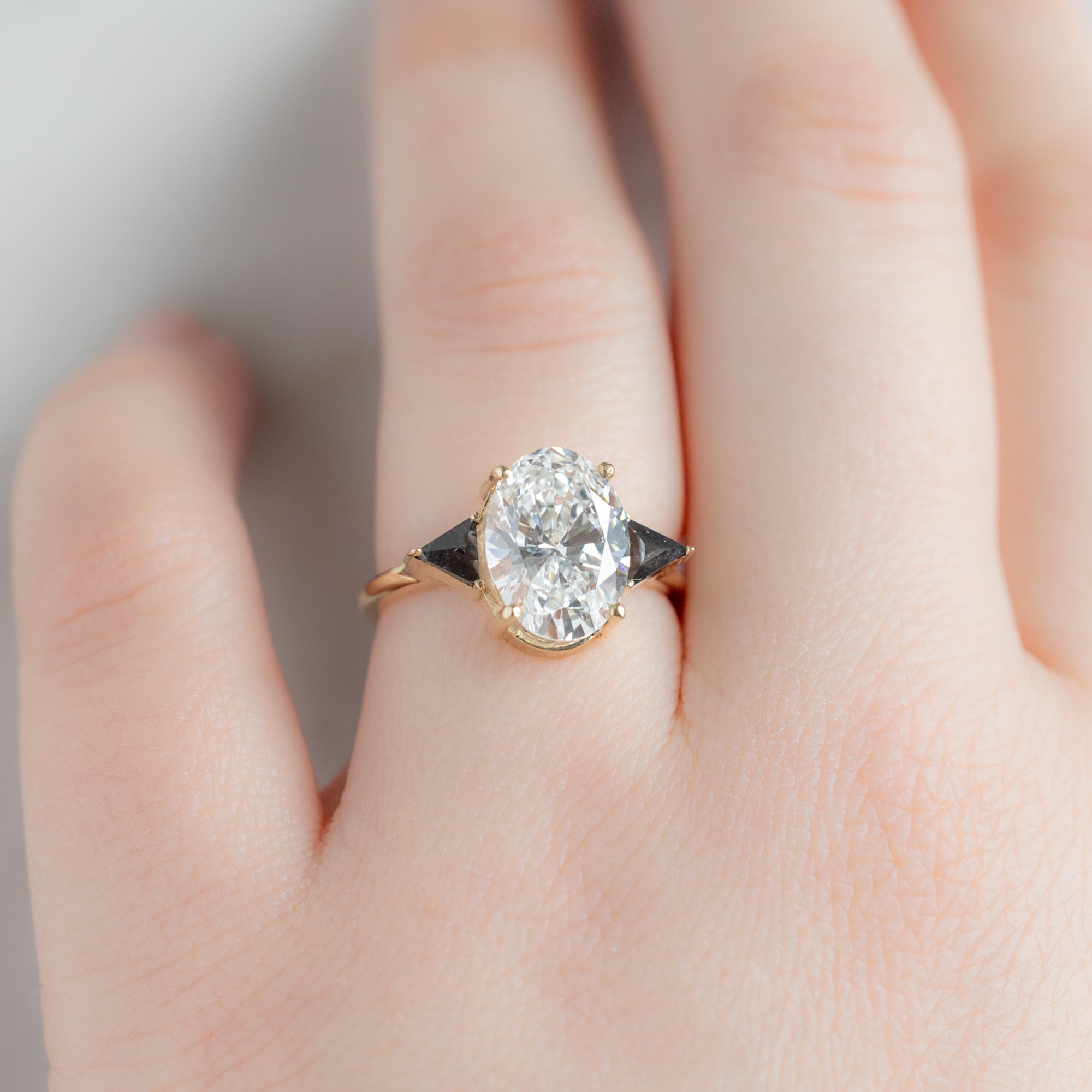 The Jade Ring with a 3.39ct Oval Lab Grown White Diamond in 14K Yellow Gold on Model