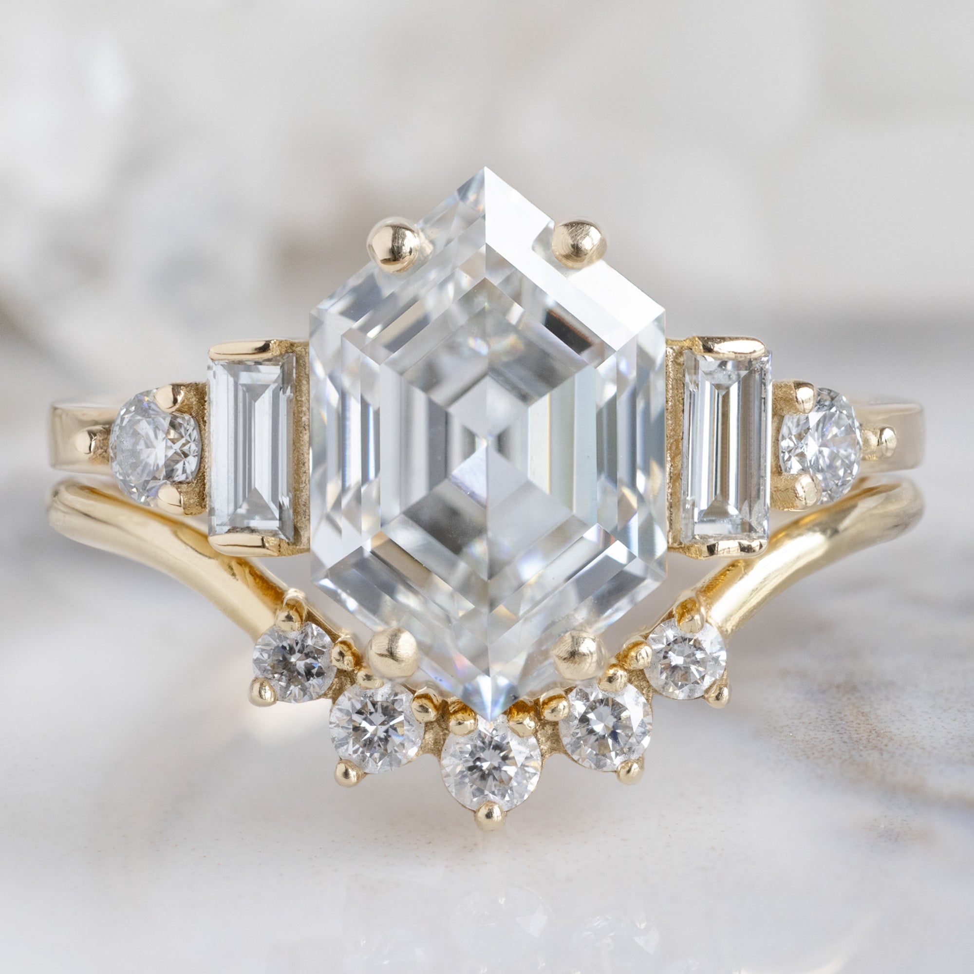 The Primrose Ring with a 2.64ct Hexagon Lab Grown White Diamond in 14K Yellow Gold Stacked with the Round White Diamond Sunburst Stacking Band