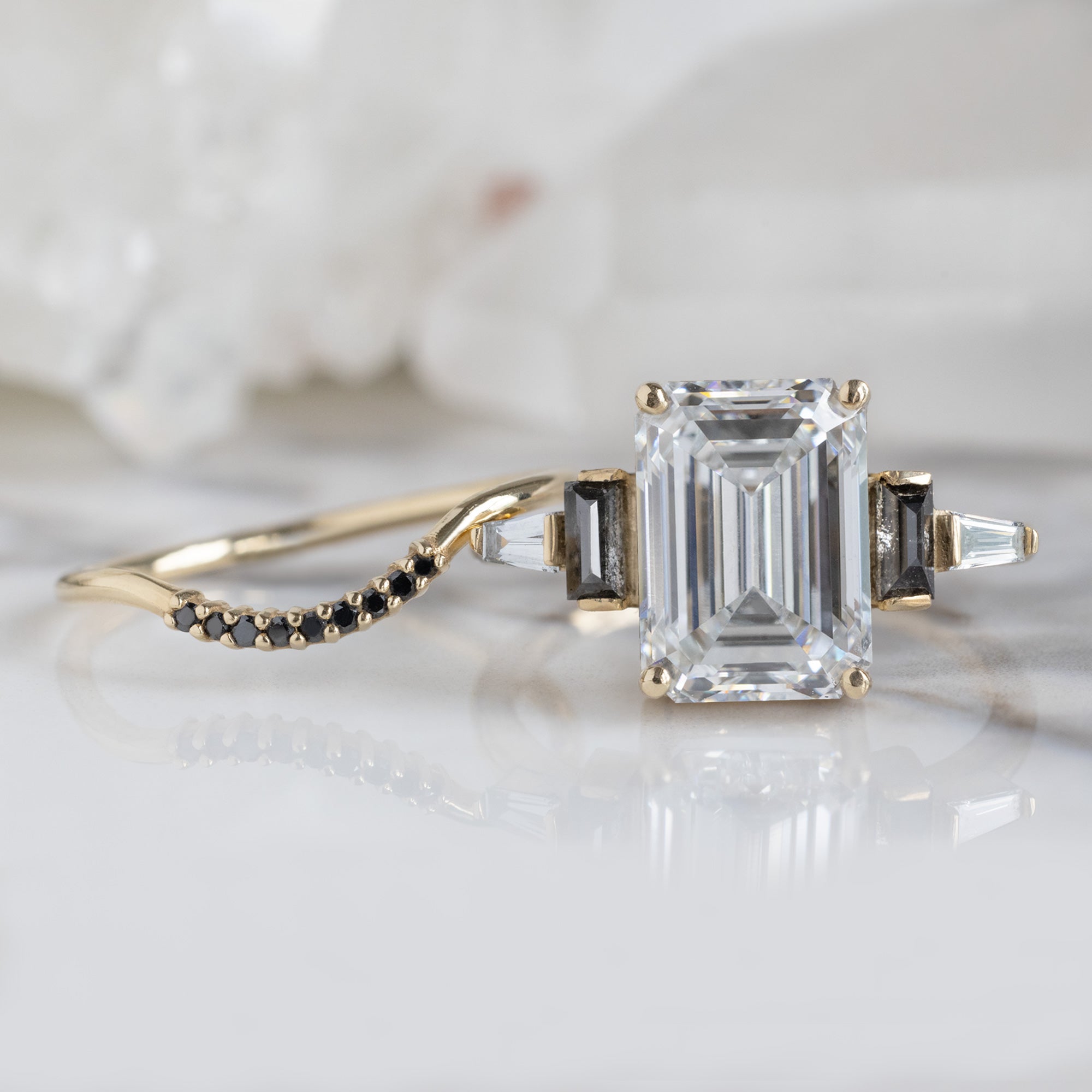 buy:the-deco-ring-3-39ct-emerald-cut-lab-grown-white-diamond-in-14k-yellow-gold,black-diamond-pave-arc-stacking-band-14k-or-18k-rose-gold