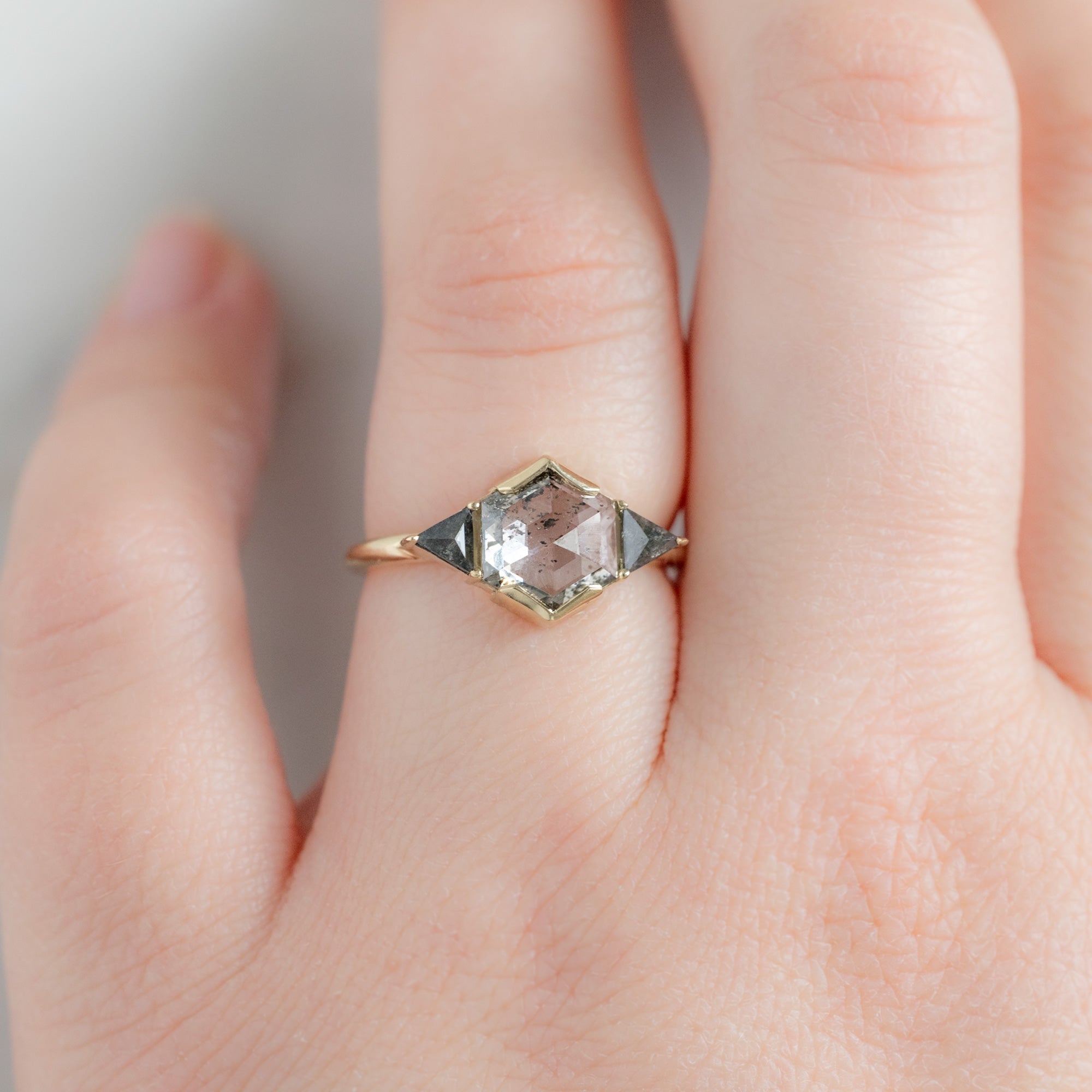 The Jade Ring with a 1.72ct Hexagon Lab Grown Salt and Pepper Diamond in 14K Yellow Gold on Model