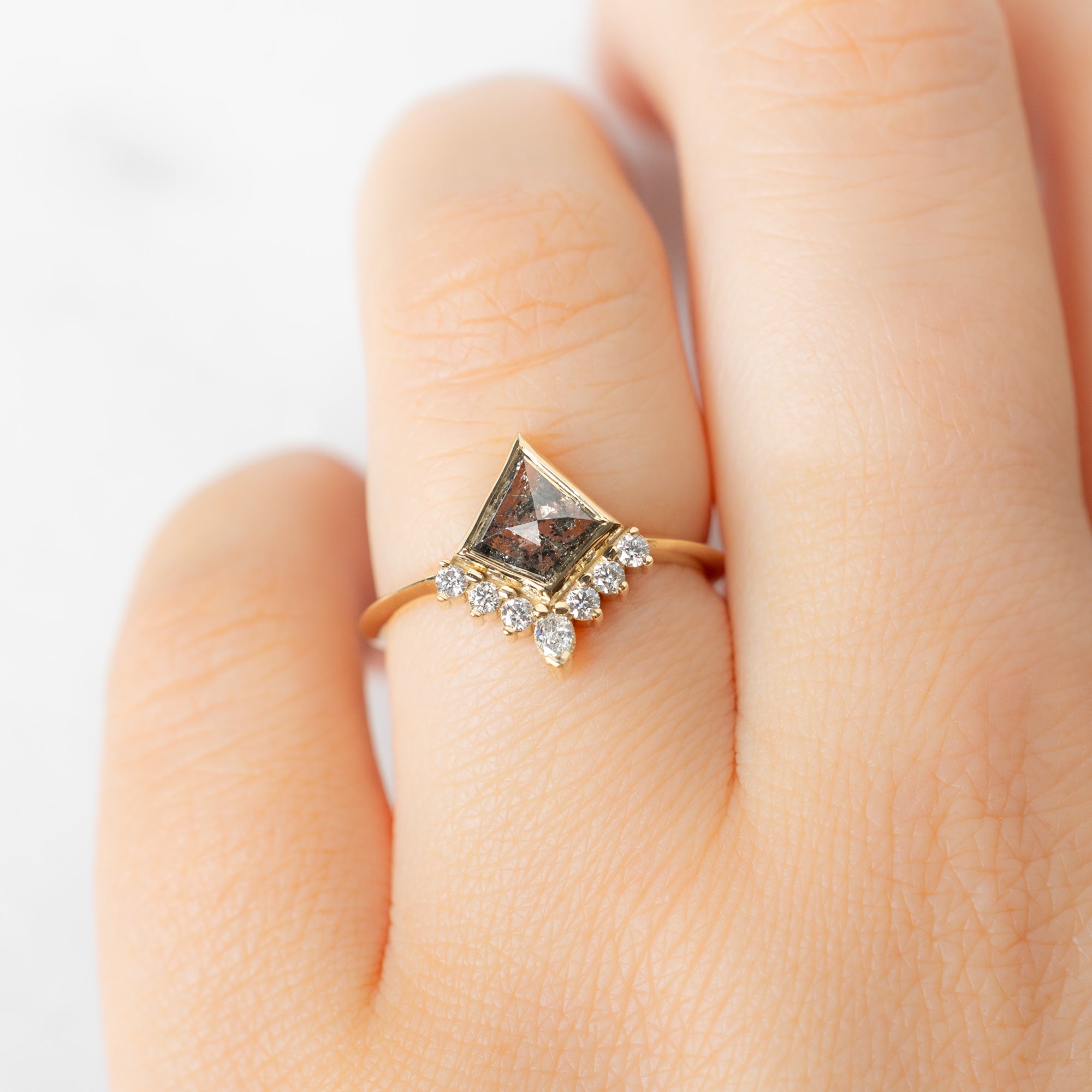 The Aster Ring with a 0.82ct Kite Salt and Pepper Diamond in 14K Yellow Gold  on Model