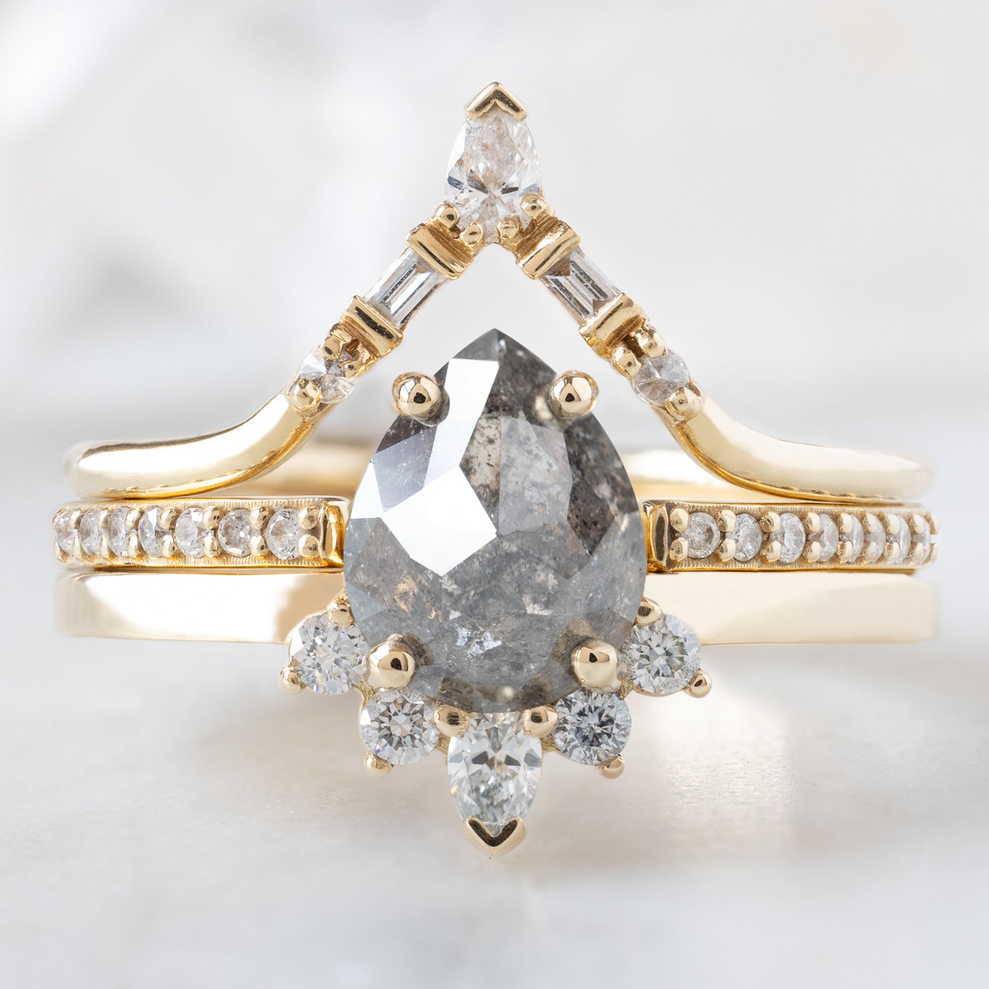 buy:white-diamond-tiara-stacking-band-14k-or-18k-yellow-gold,open-cuff-white-diamond-pave-stacking-band-14k-or-18k-yellow-gold,the-aster-ring-1-31ct-pear-salt-and-pepper-diamond-in-14k-yellow-gold
