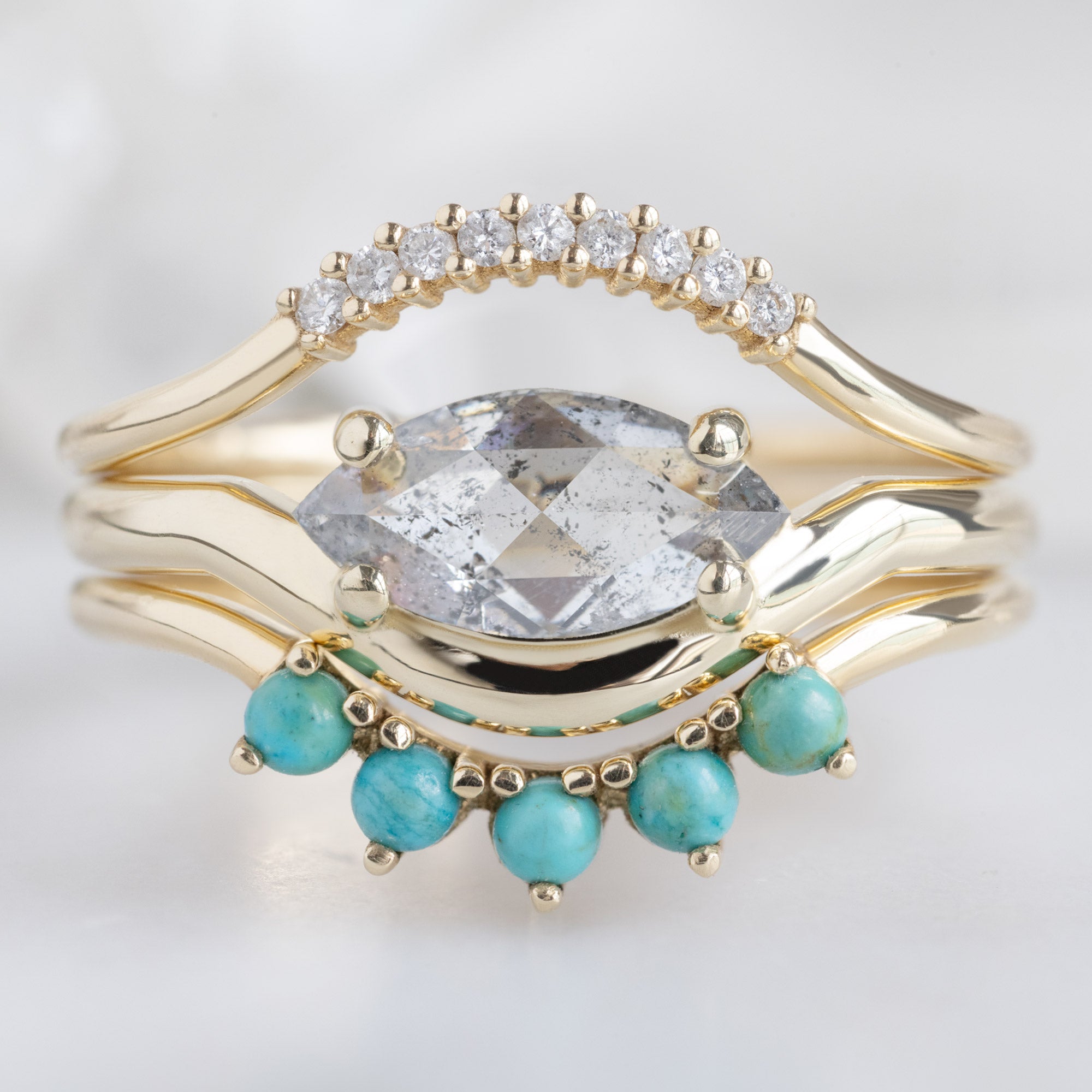 buy:white-diamond-pave-arc-stacking-band-14k-or-18k-yellow-gold,the-wave-ring-0-72ct-marquise-salt-and-pepper-diamond-in-14k-yellow-gold,round-turquoise-sunburst-stacking-band-5-stone-setting-in-14k-or-18k-white-gold