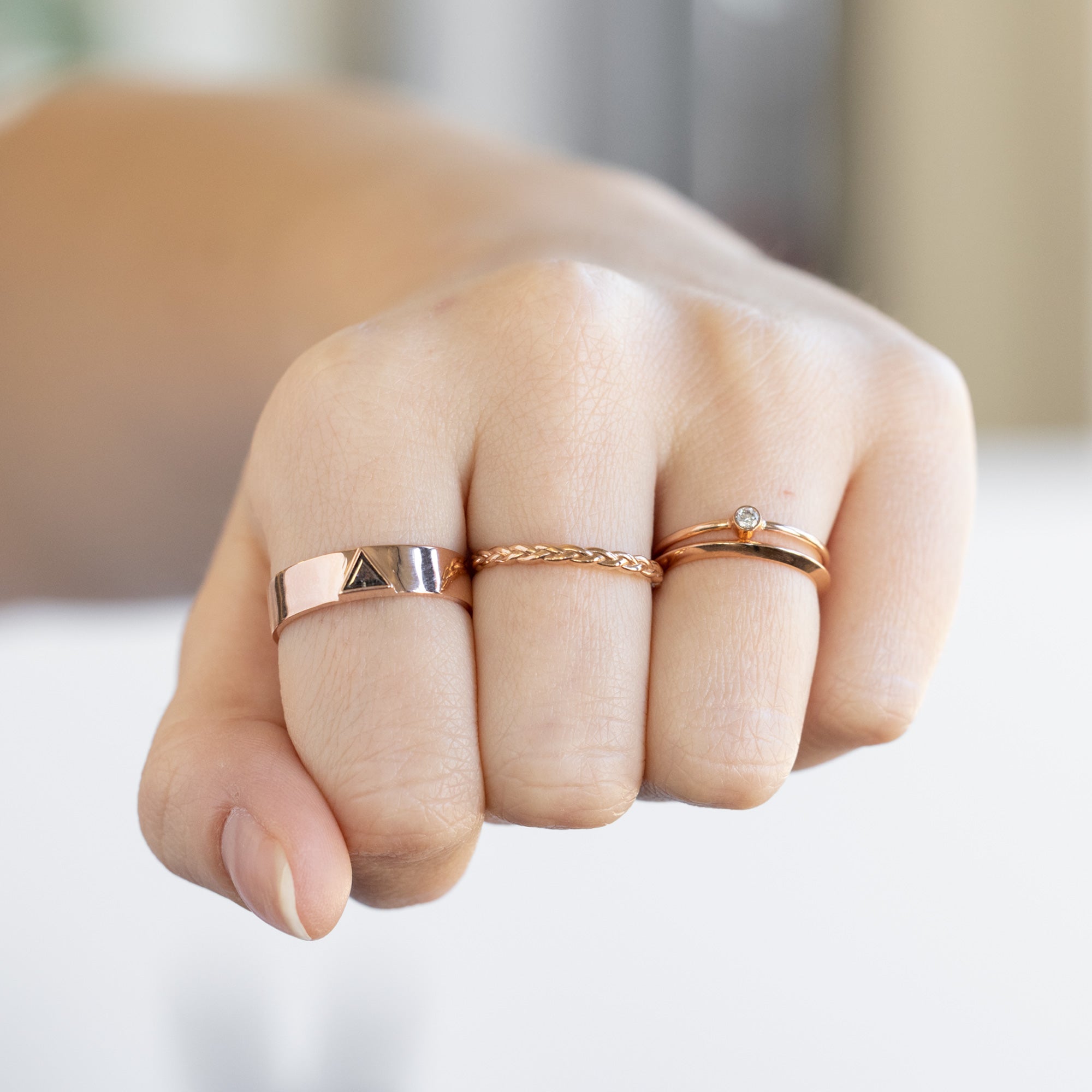 buy:the-cigar-band-with-a-trillion-salt-and-pepper-diamond-yellow-rose-or-white-gold,the-gold-braided-stacking-ring-14k-rose-gold,the-teensy-custom-white-diamond-stacking-ring-14k-yellow-gold,the-unisex-gold-knife-edge-band-14k-yellow-gold