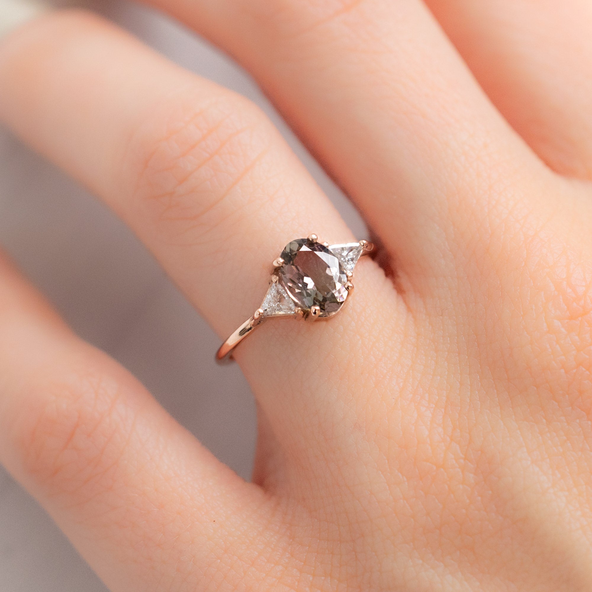 The Jade Ring with an Oval Bicolor Tourmaline in 14K Rose Gold on Model