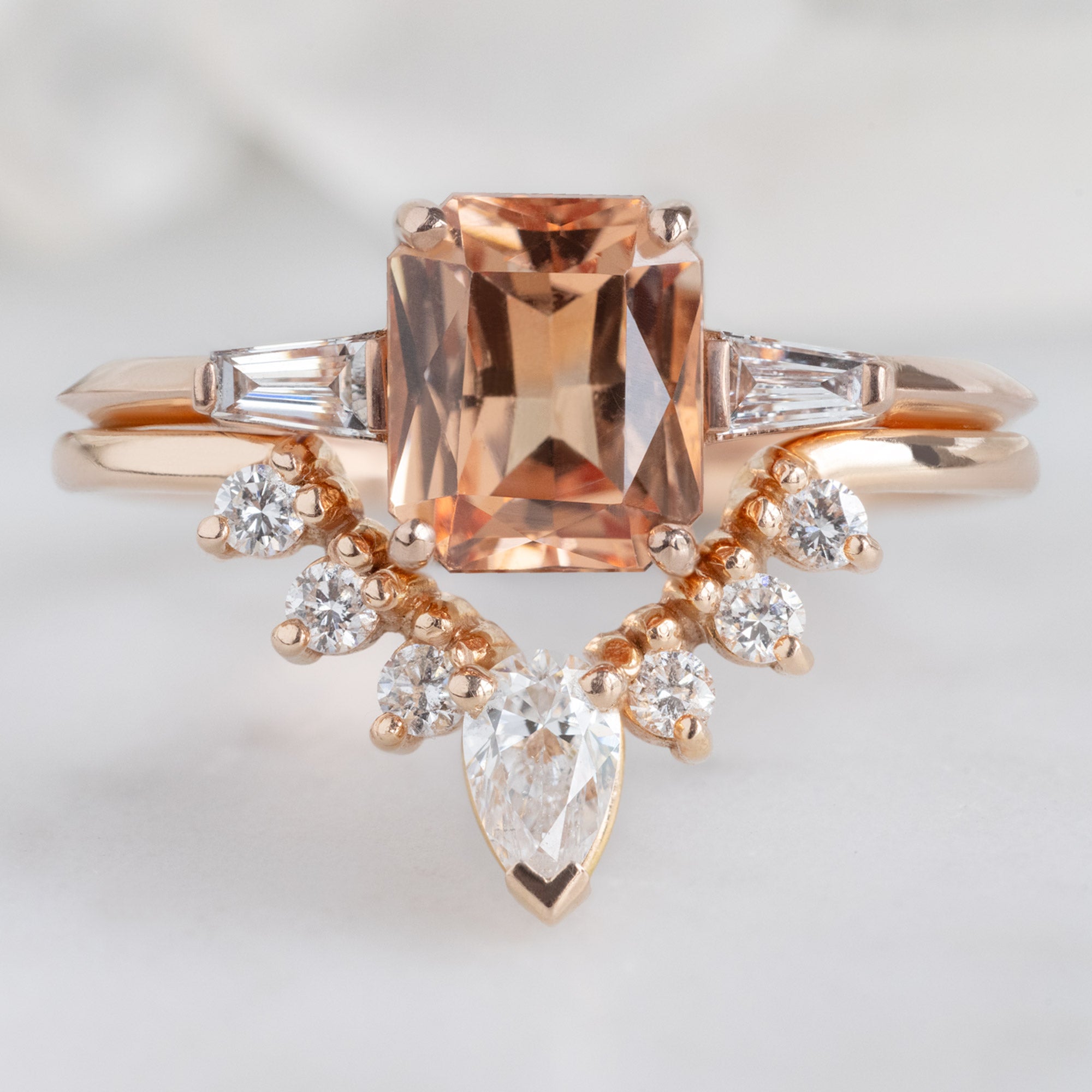 The Ash Ring with a 1.43ct Emerald Cut Garnet in 14K Rose Gold Stacked with White Diamond Sunburst Stacking Band