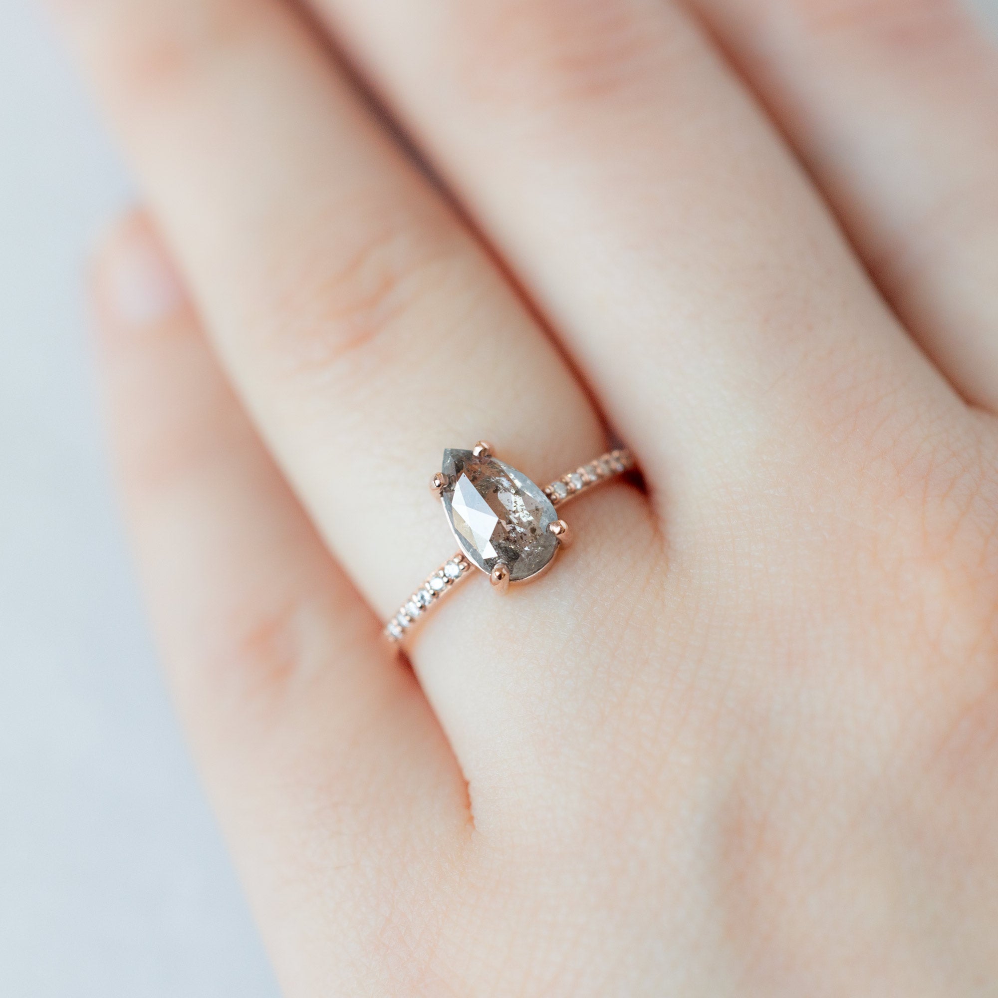 The Willow Ring with a 1.38ct Pear Salt and Pepper Diamond in 14K Rose Gold on Model