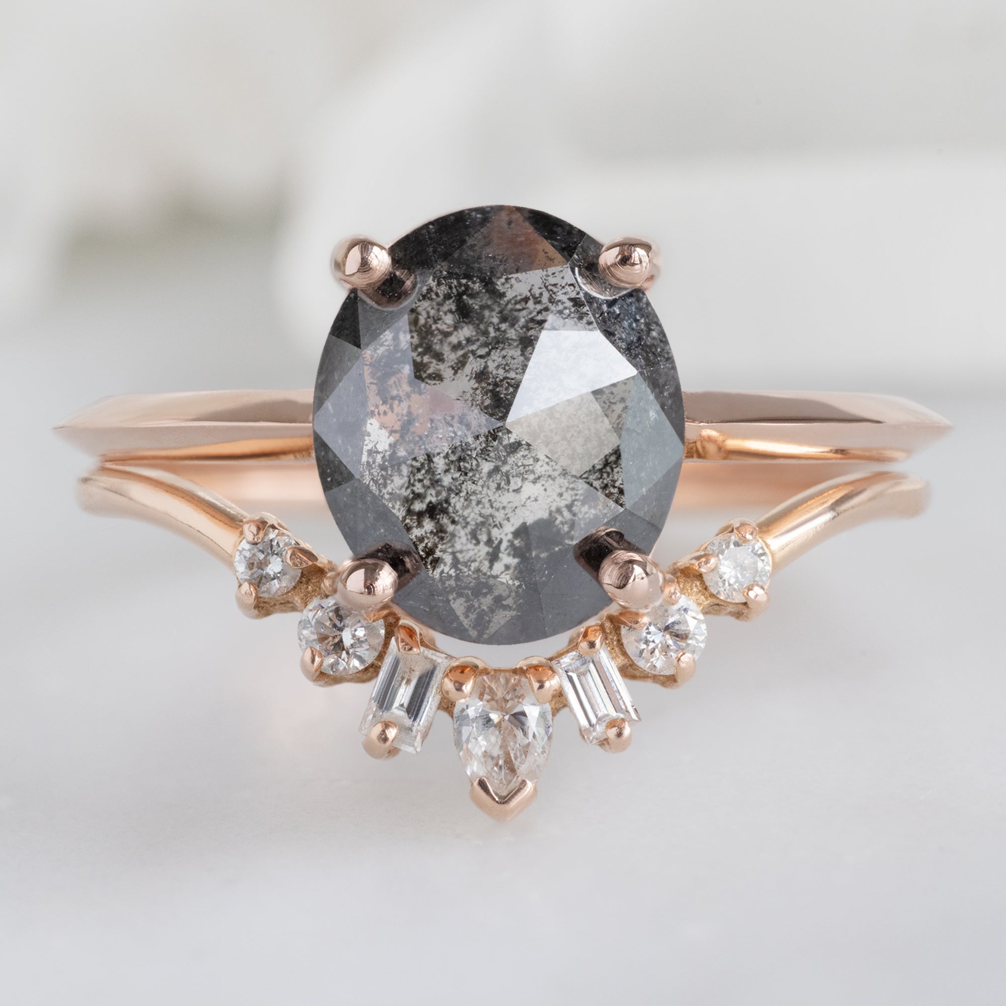 The Bryn Ring with a 1.53ct Oval Salt and Pepper Diamond in 14K Rose Gold Stacked with Geometric Diamond Sunburst Stacking Band