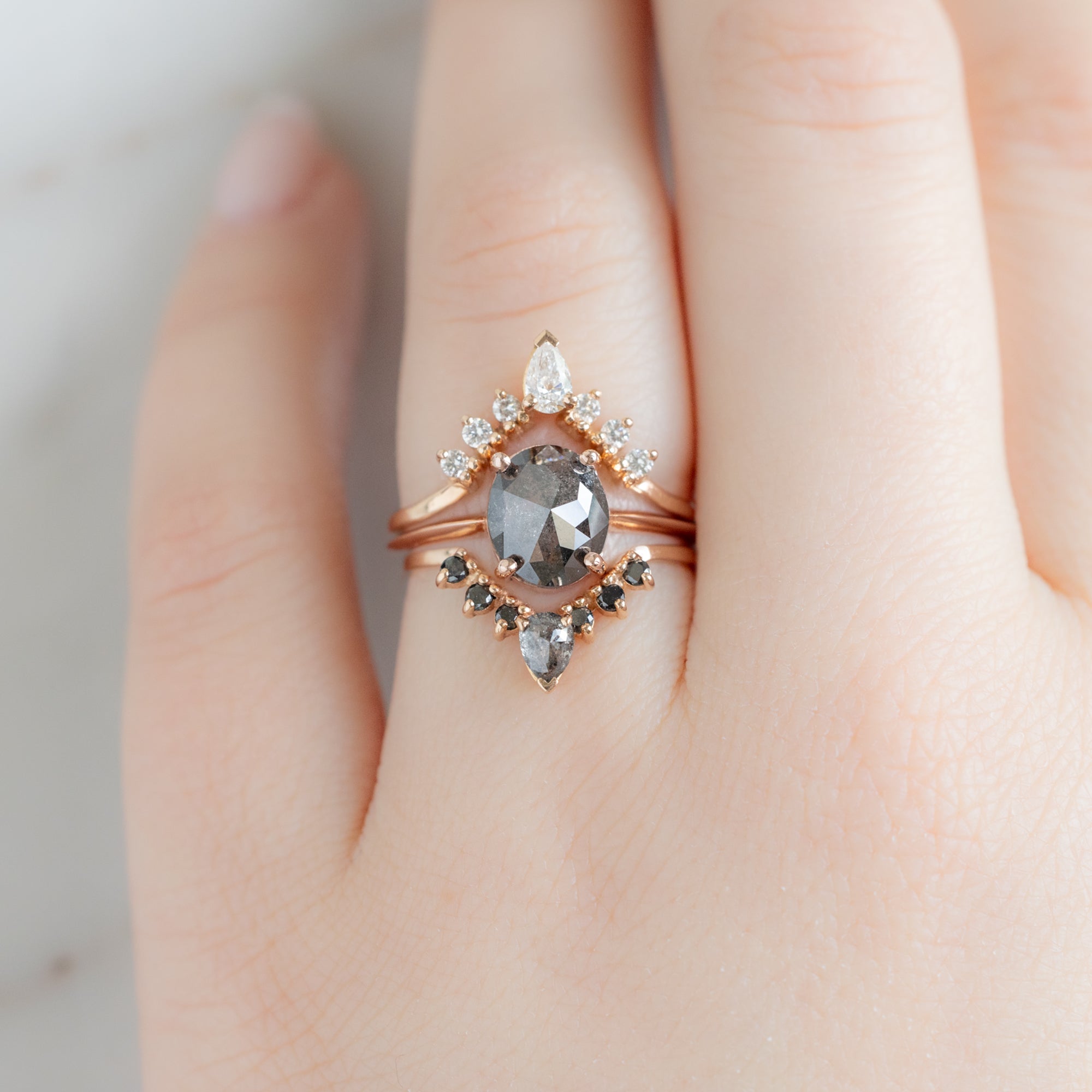 buy:white-pear-diamond-sunburst-stacking-band-14k-gold,the-bryn-ring-1-53ct-oval-salt-and-pepper-diamond-in-14k-rose-gold,pear-black-diamond-sunburst-stacking-band-14k-gold