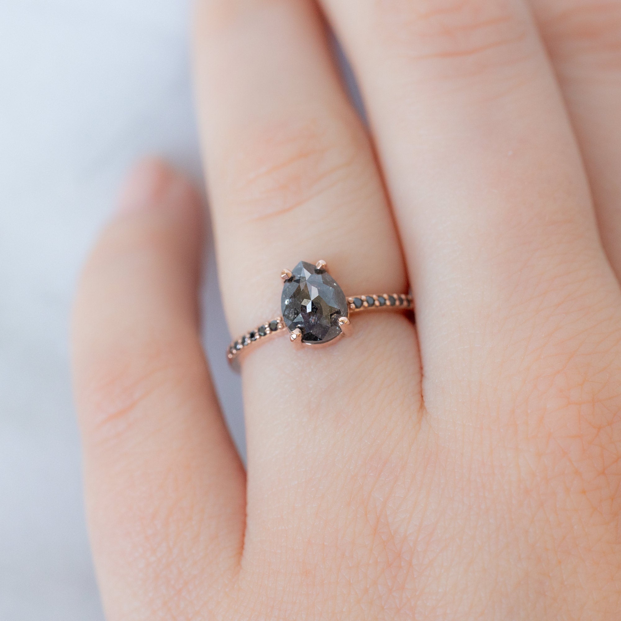 The Willow Ring with a 1.59ct Pear Black Diamond in 14K Rose Gold on Model