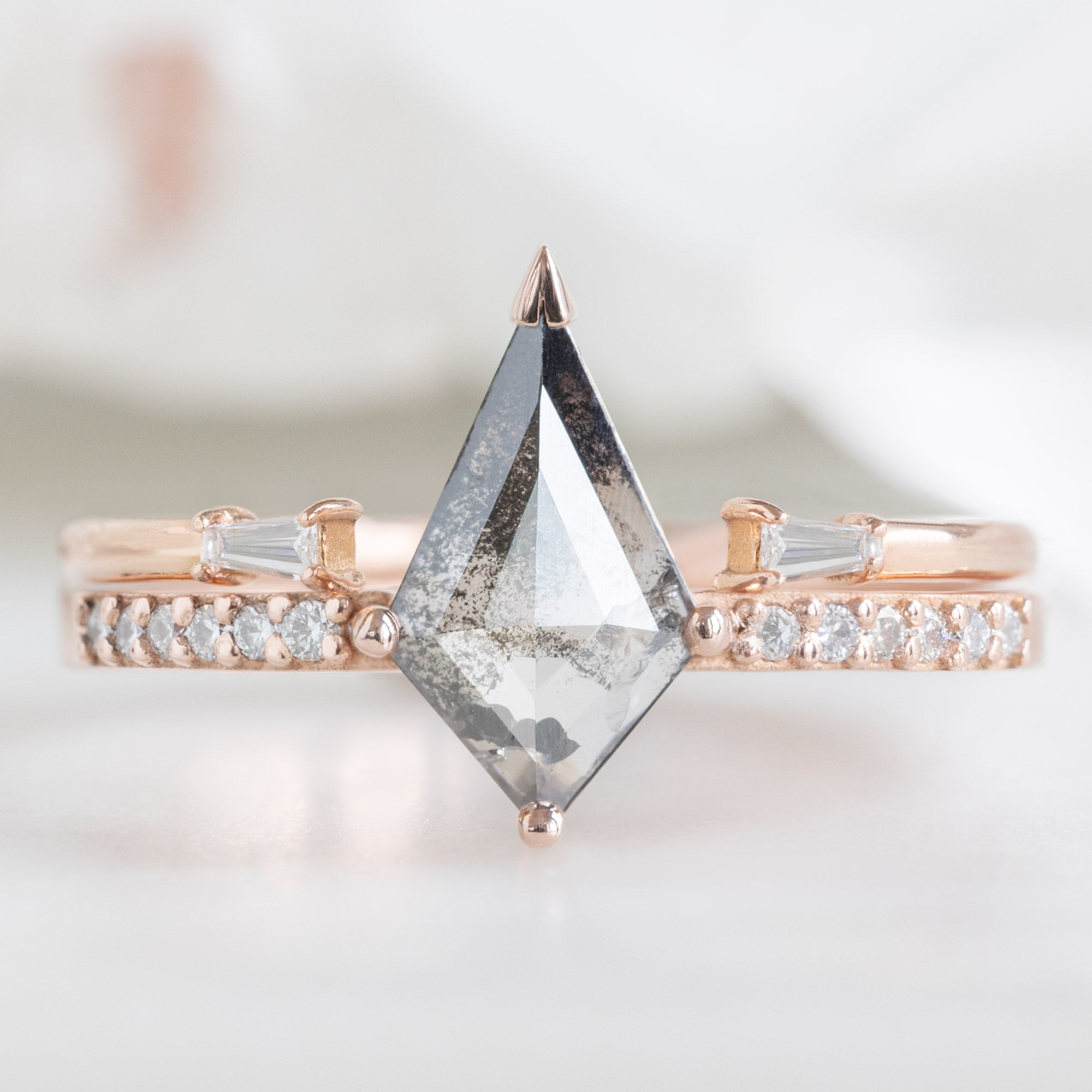 The Willow Ring with a Kite Shaped Salt and Pepper Diamond in 14K Rose Gold Stacked with the Open Cuff Baguette Stacking Band