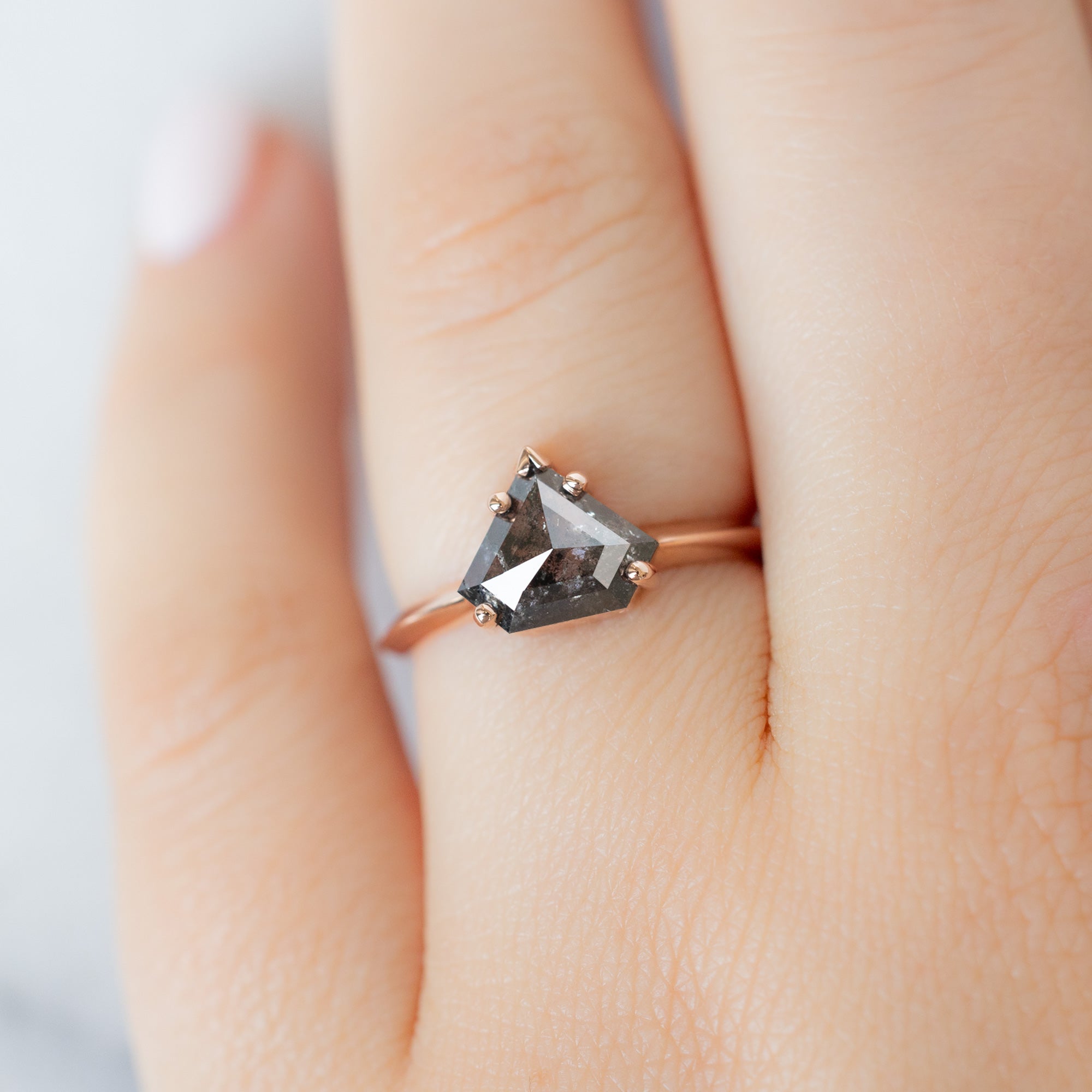 The Sage Ring with a 1.18ct Shield Salt and Pepper Diamond in 14K Rose Gold on Model