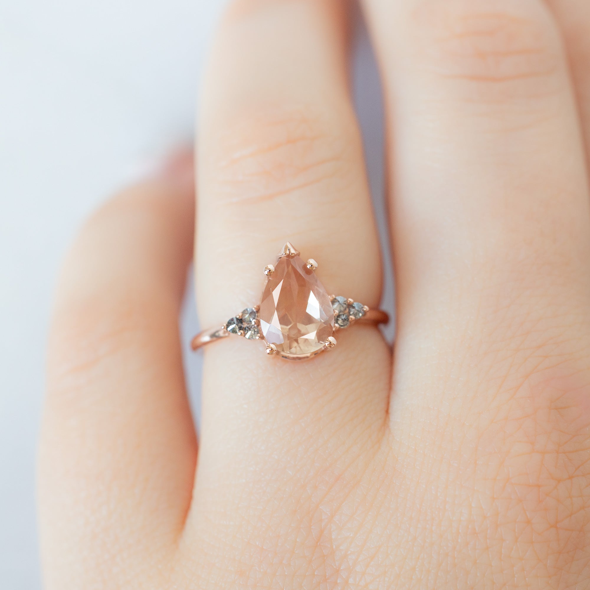 The Ivy Ring with a 1.89ct Pear Shaped Sunstone in 14K Rose Gold on Model