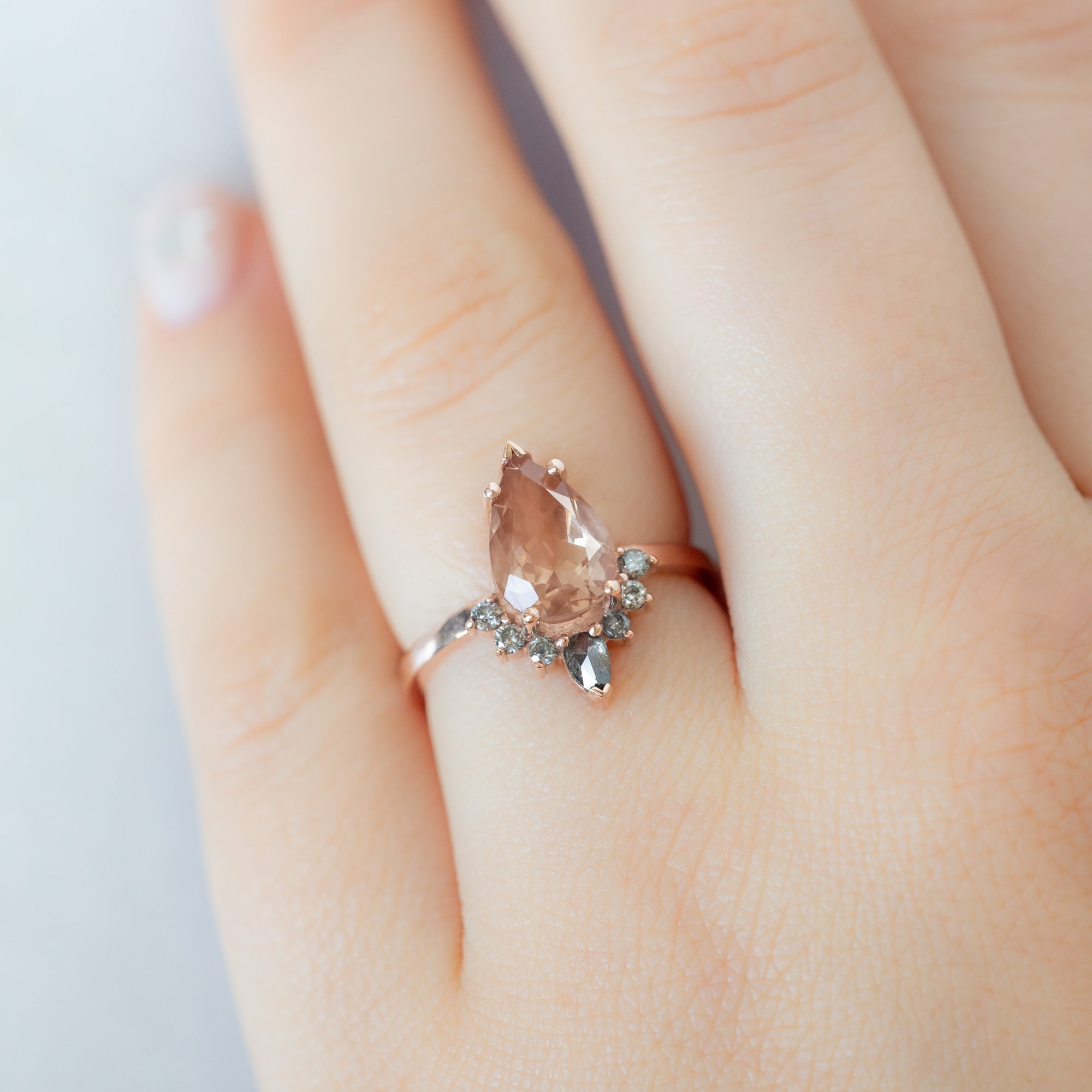 The Aster Ring with a 1.92ct Pear Sunstone in 14K Rose Gold on Model