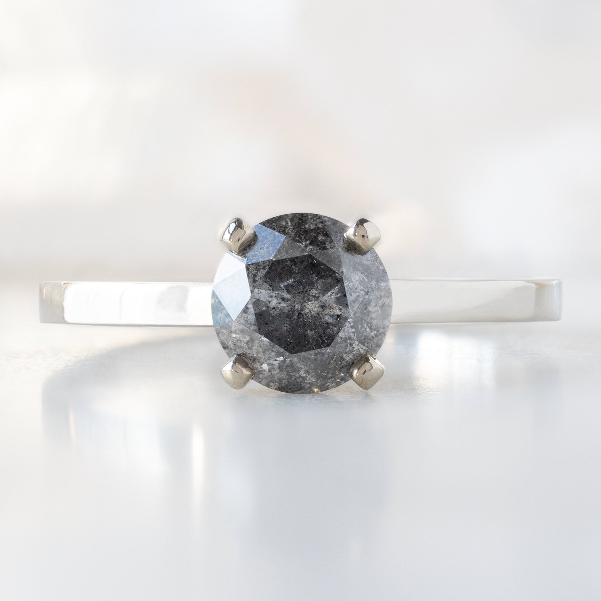 The Bryn Ring with a 1.01ct Round Salt and Pepper Diamond in 14K White Gold on White Marble