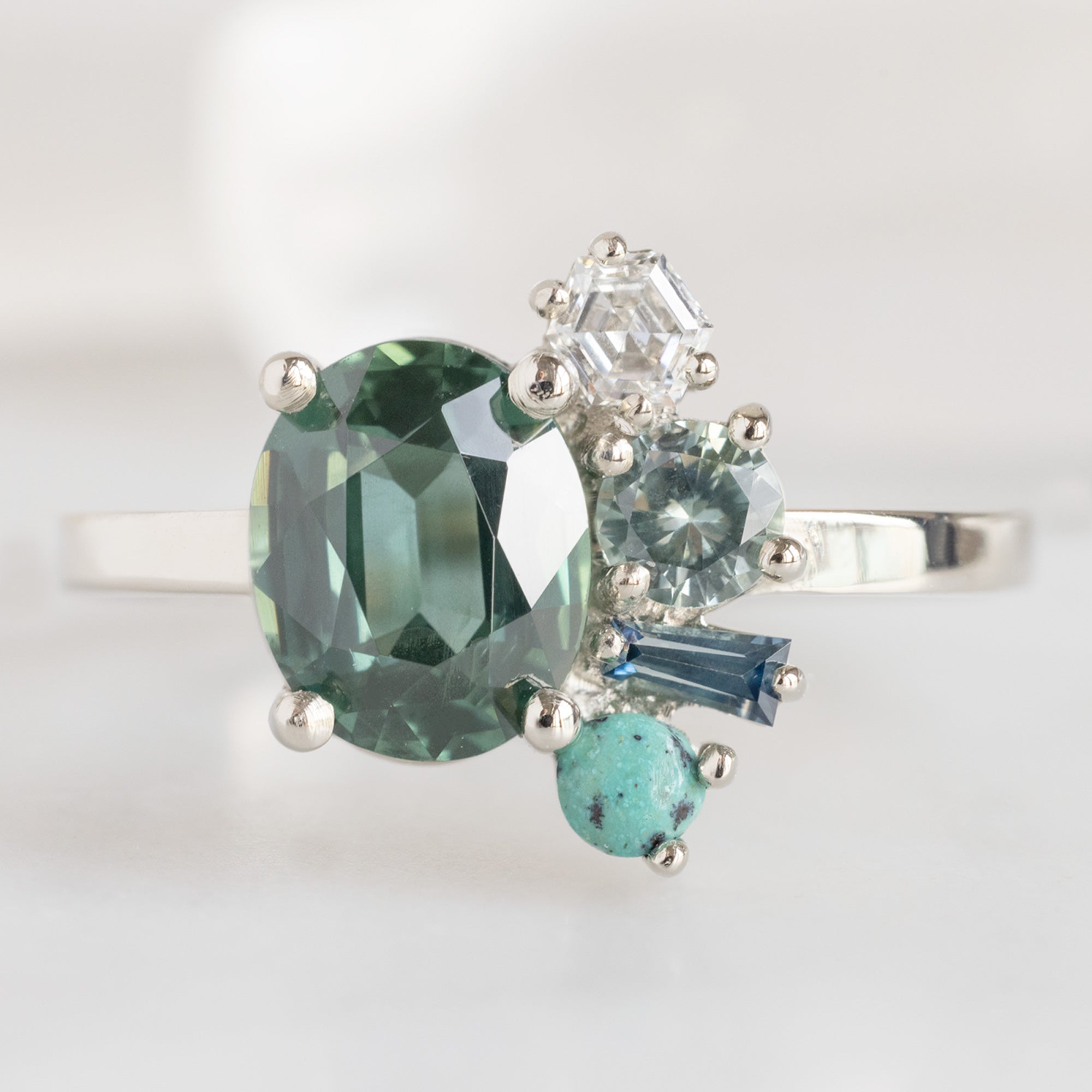 The Watercolor Cluster Ring with a 1.53ct Oval Green Sapphire in 14K White Gold