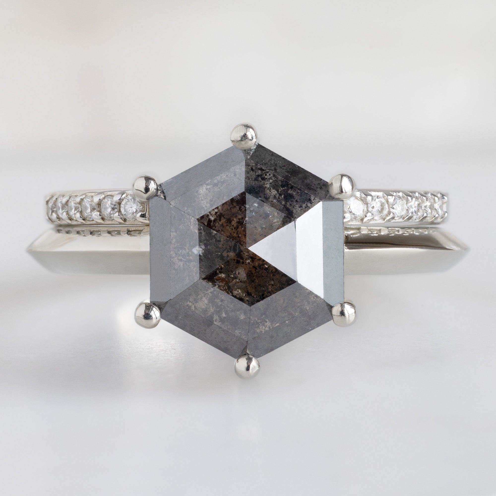 The Bryn Ring with a 2.33ct Black Hexagon Diamond in 14K White Gold Stacked with the Open Cuff Pavé Diamond Stacking Band