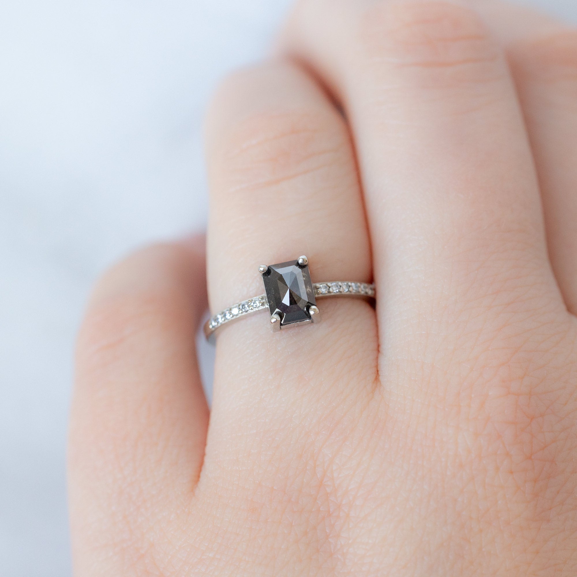 The Willow Ring with a 1.05ct Emerald Cut Black Diamond in 14K White Gold on Model