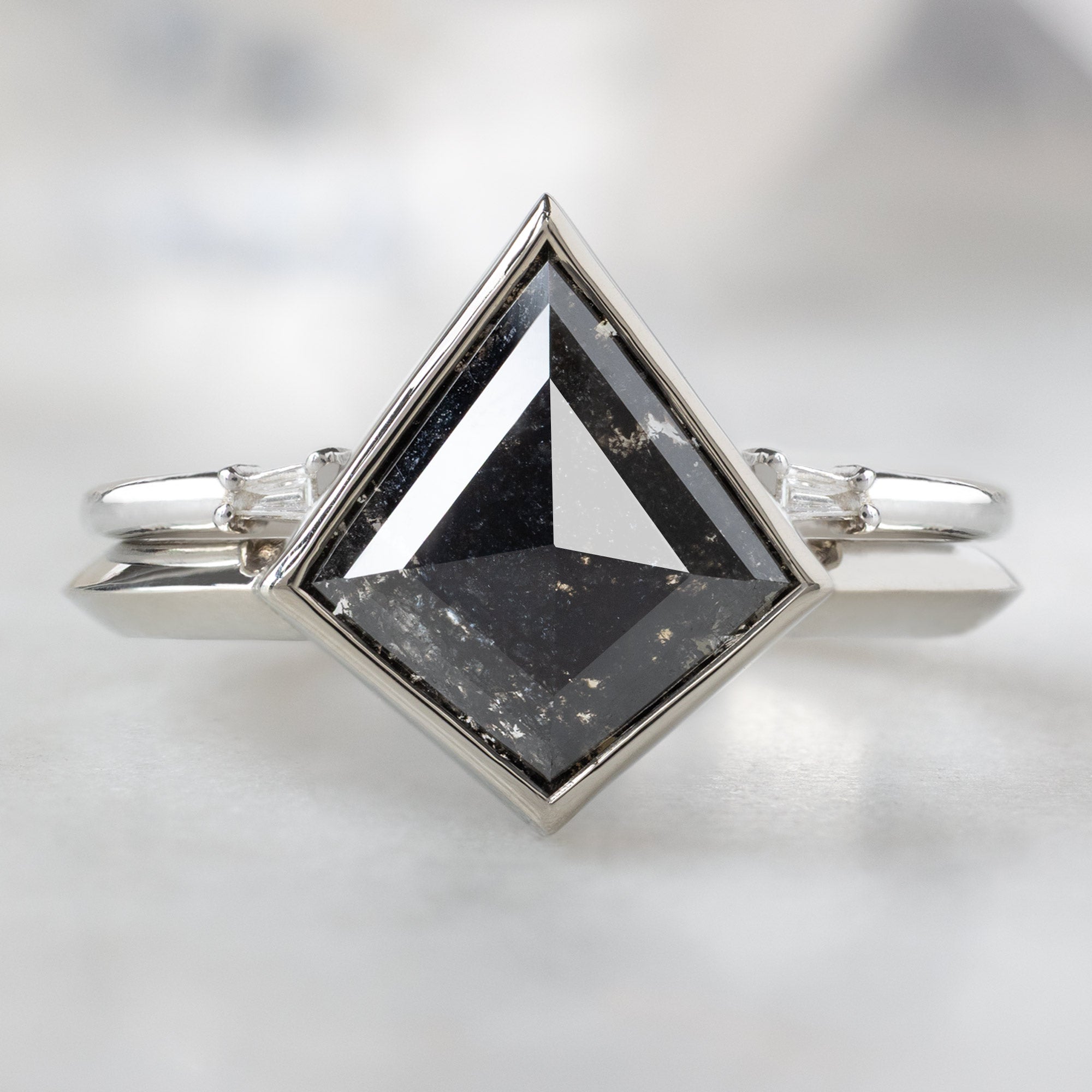 The Hazel Ring with a 1.97ct Kite Black Diamond in 14K White Gold Stacked with the Open Cuff Baguette Diamond Stacking Band