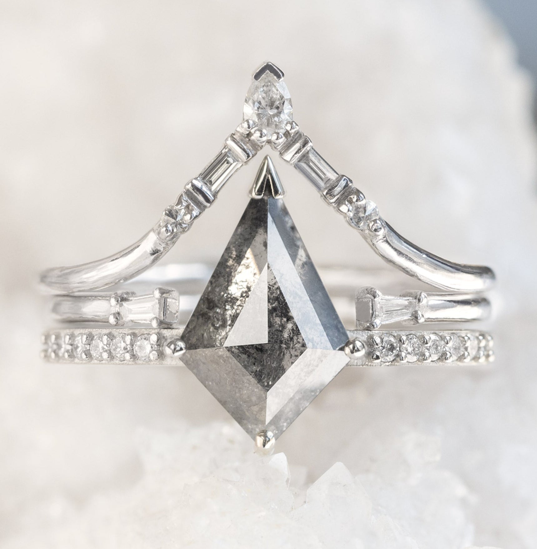 The Willow Ring with a Kite Shaped Salt and Pepper Diamond in 14K White Gold Stacked with White Diamond Stacking Bands