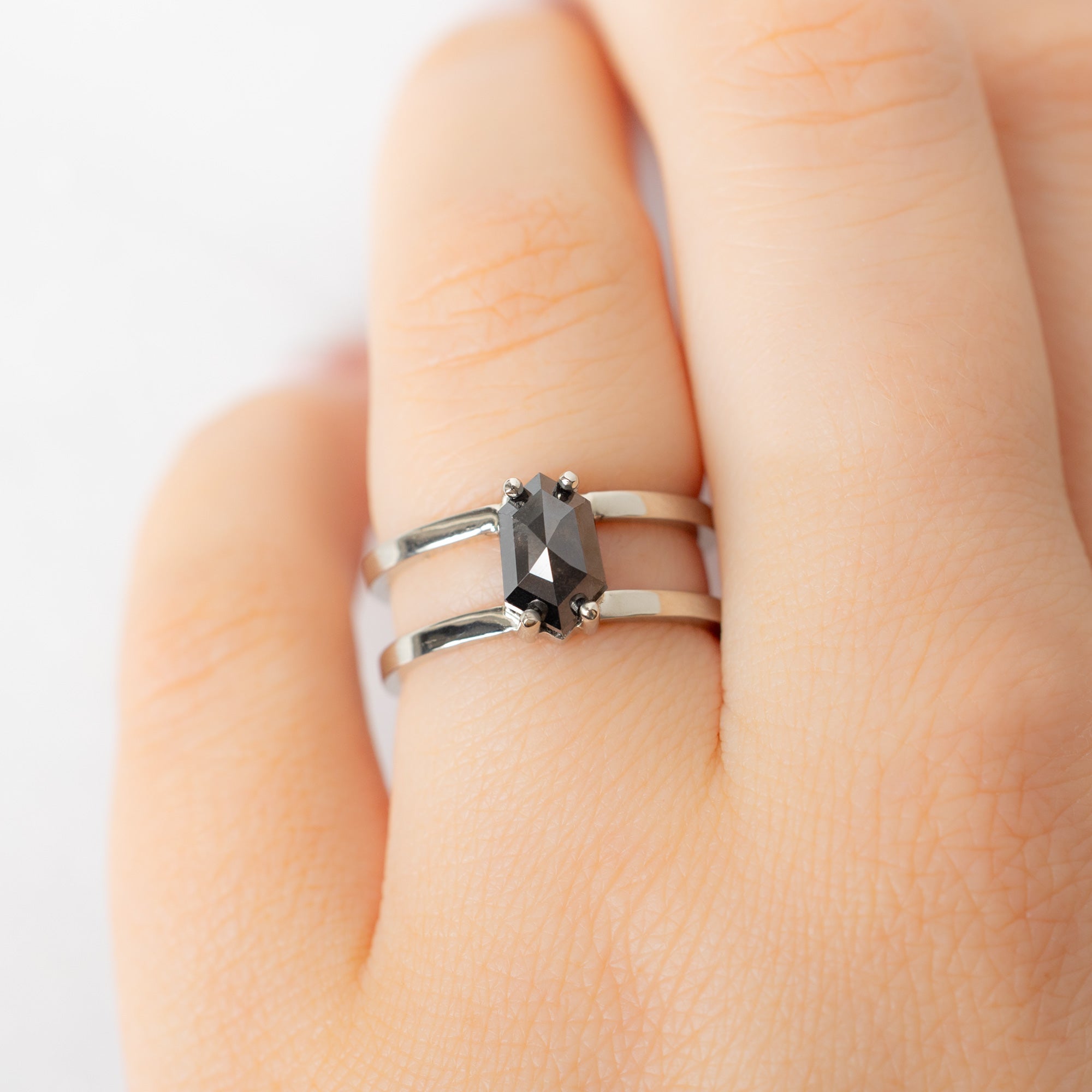 The Poppy Ring with a 1.56ct Hexagon Black Diamond in 14K White Gold on Model