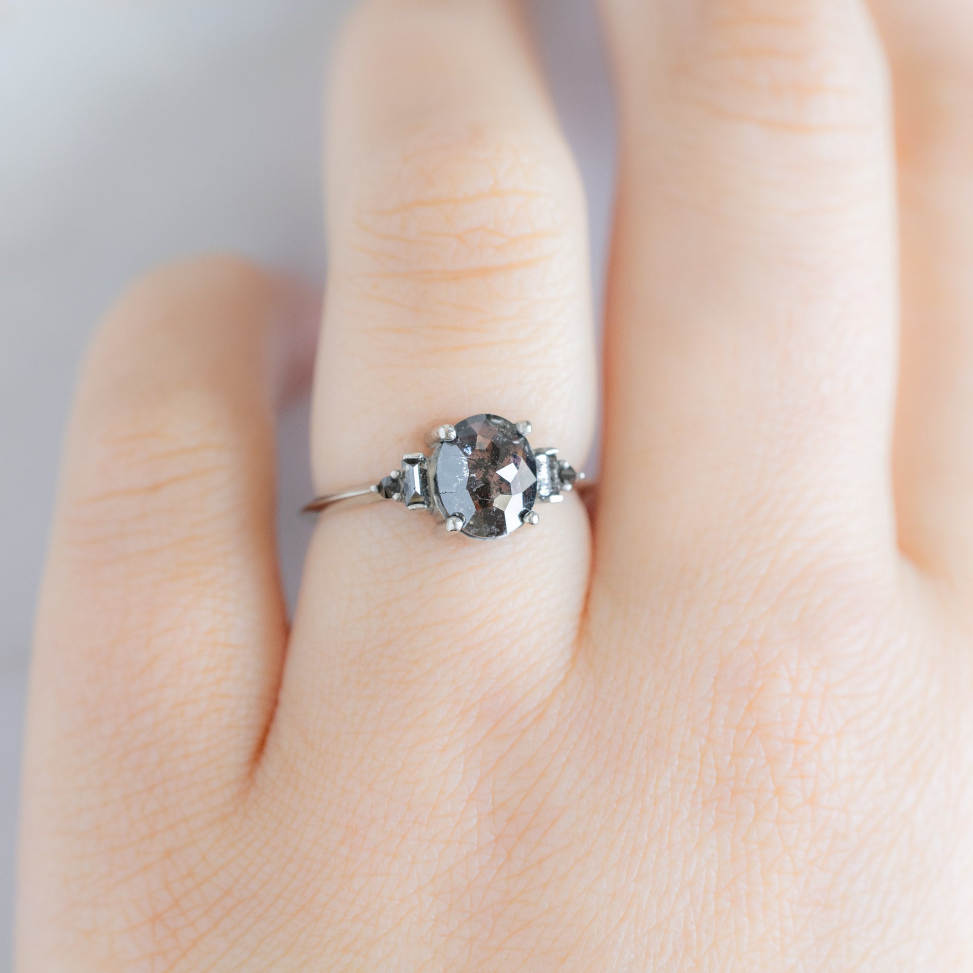 The Primrose Ring with a 1.32ct Oval Salt and Pepper Diamond in 14K White Gold on Model