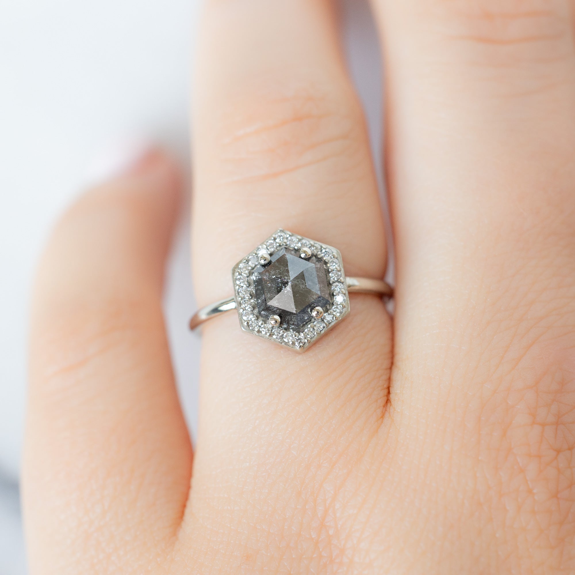 The Dahlia Ring with a 1.08ct Hexagon Black Diamond in 14K White Gold on Model