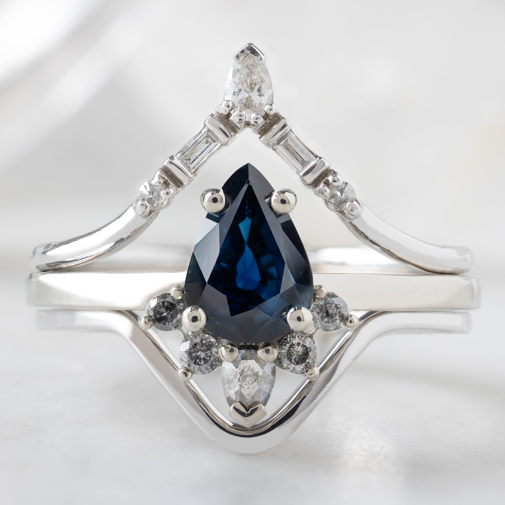 buy:white-diamond-tiara-stacking-band-14k-or-18k-yellow-gold,the-aster-ring-0-90ct-pear-blue-sapphire-in-14k-white-gold-1,gold-peak-stacking-band-14k-yellow-gold