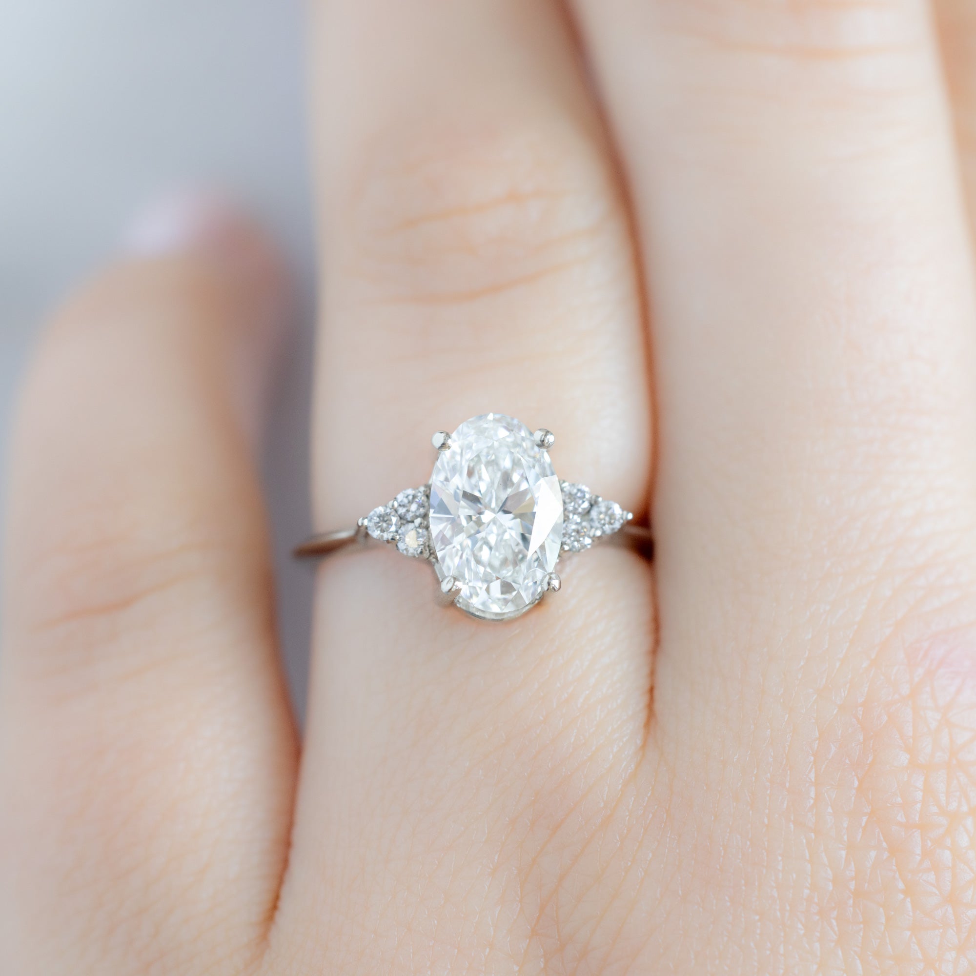The Ivy Ring with a 1.88ct Oval Lab Grown White Diamond in 14K White Gold on Model