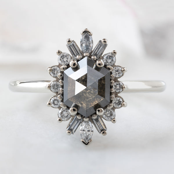 The Camellia Ring with a 0.94ct Hexagon Black Diamond in 14K White Gold on White Marble